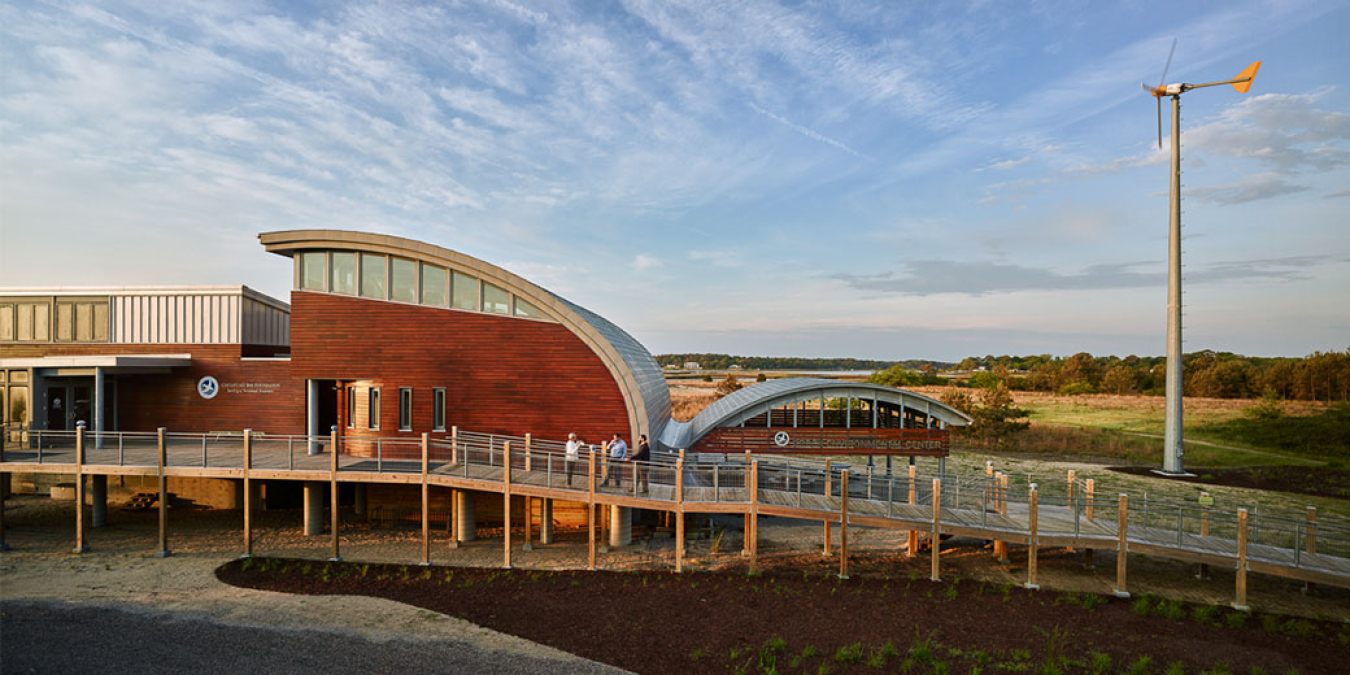 Photo of CBF's Brock Environmental Center against a blue sky.