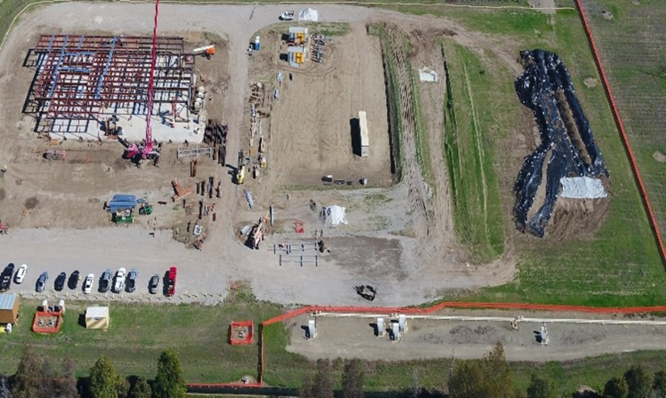 An aerial photo of the steel frame topping off at the LLNL Emergency Operations Center site.