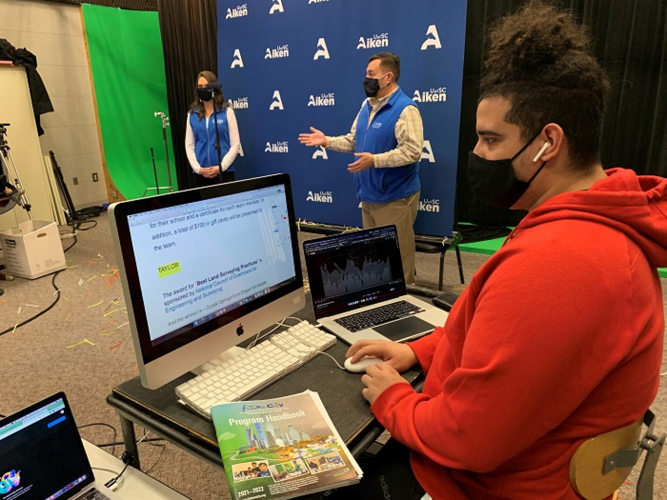 South Carolina Regional Future City Coordinators Taylor Rice, with Savannah River Nuclear Solutions, left, and John Hutchens, with the University of South Carolina Aiken (USC Aiken), center, announce the winners of this year’s virtual Future City Regional Competition. 