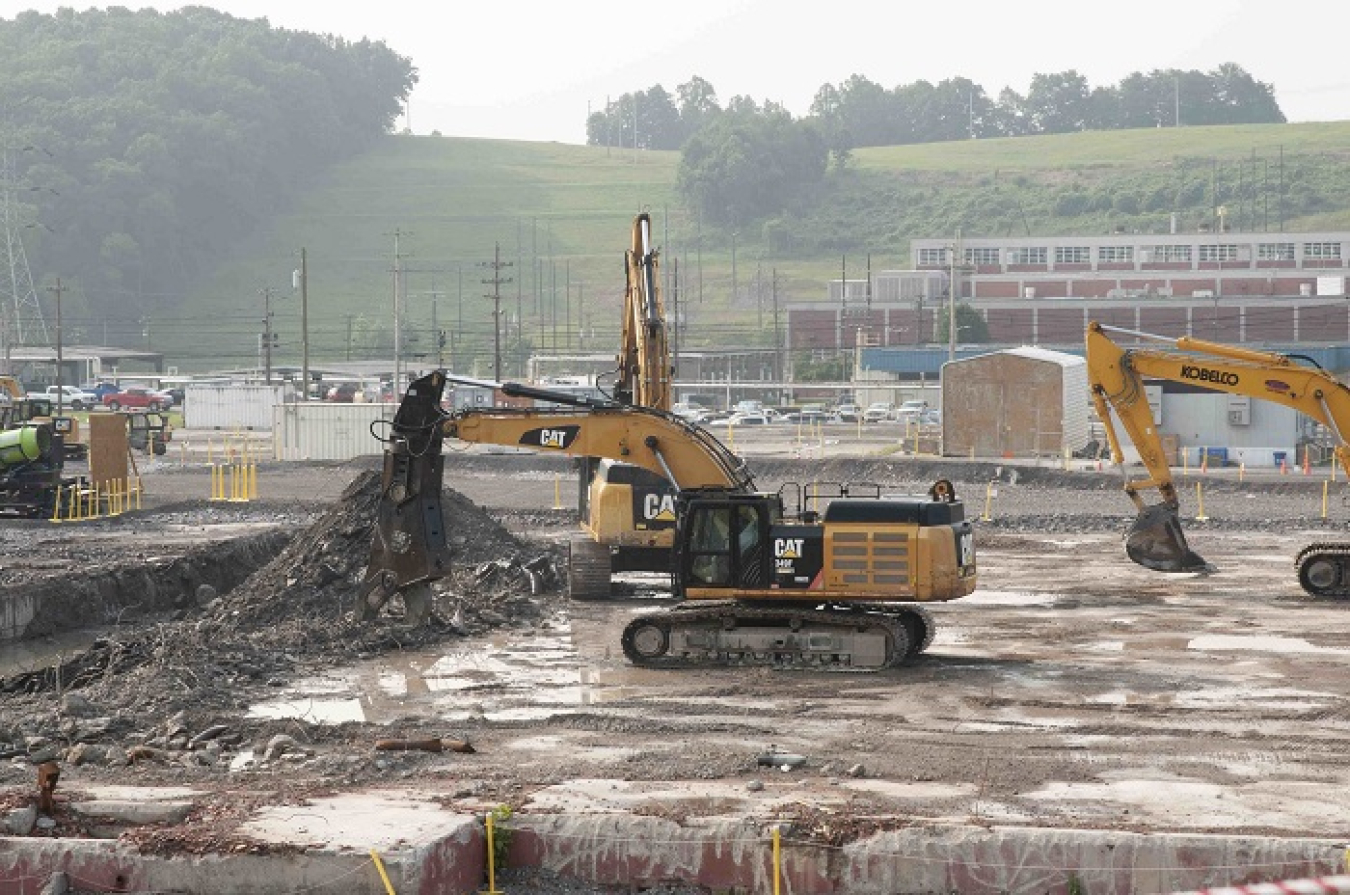 Workers are in the final stages of removing the Biology Complex slab at the Y-12 National Security Complex.