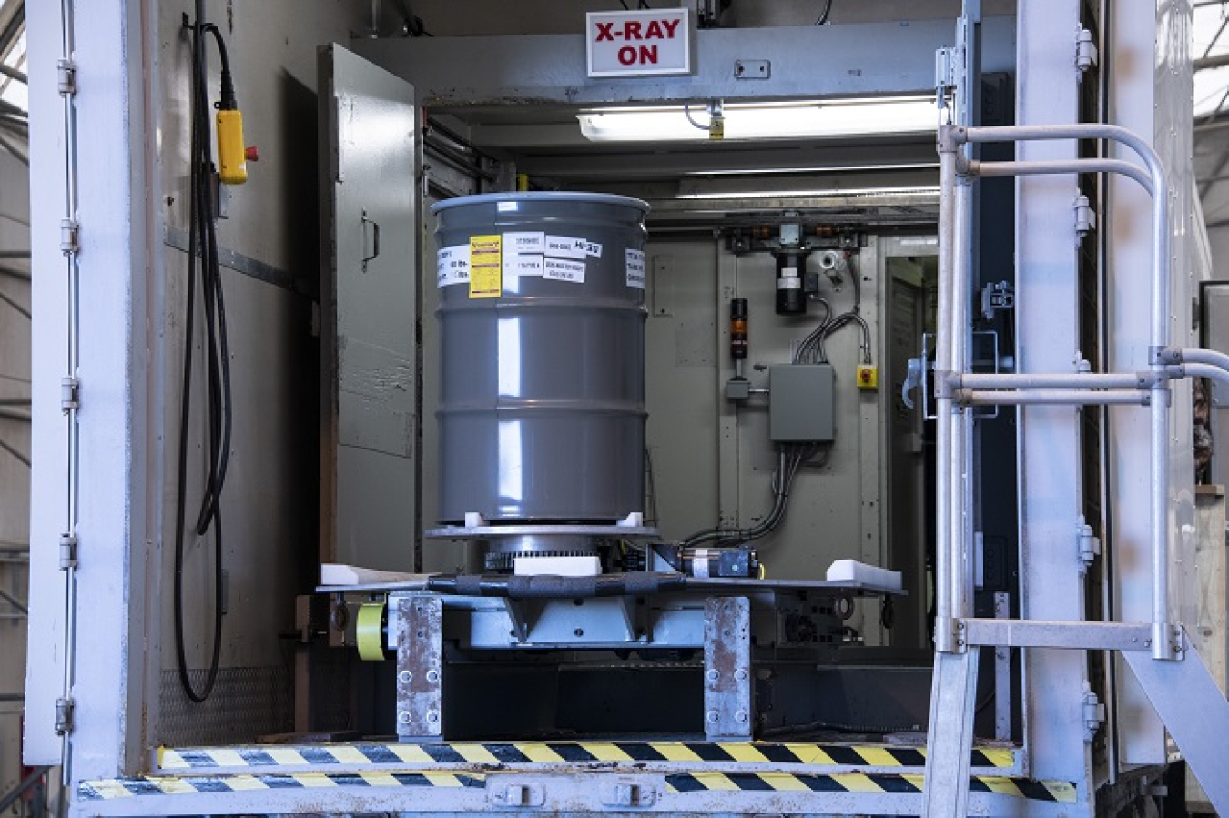 A transuranic waste drum is ready for characterization in the real-time radiography unit at the Solid Waste Management Facility at the Savannah River Site.