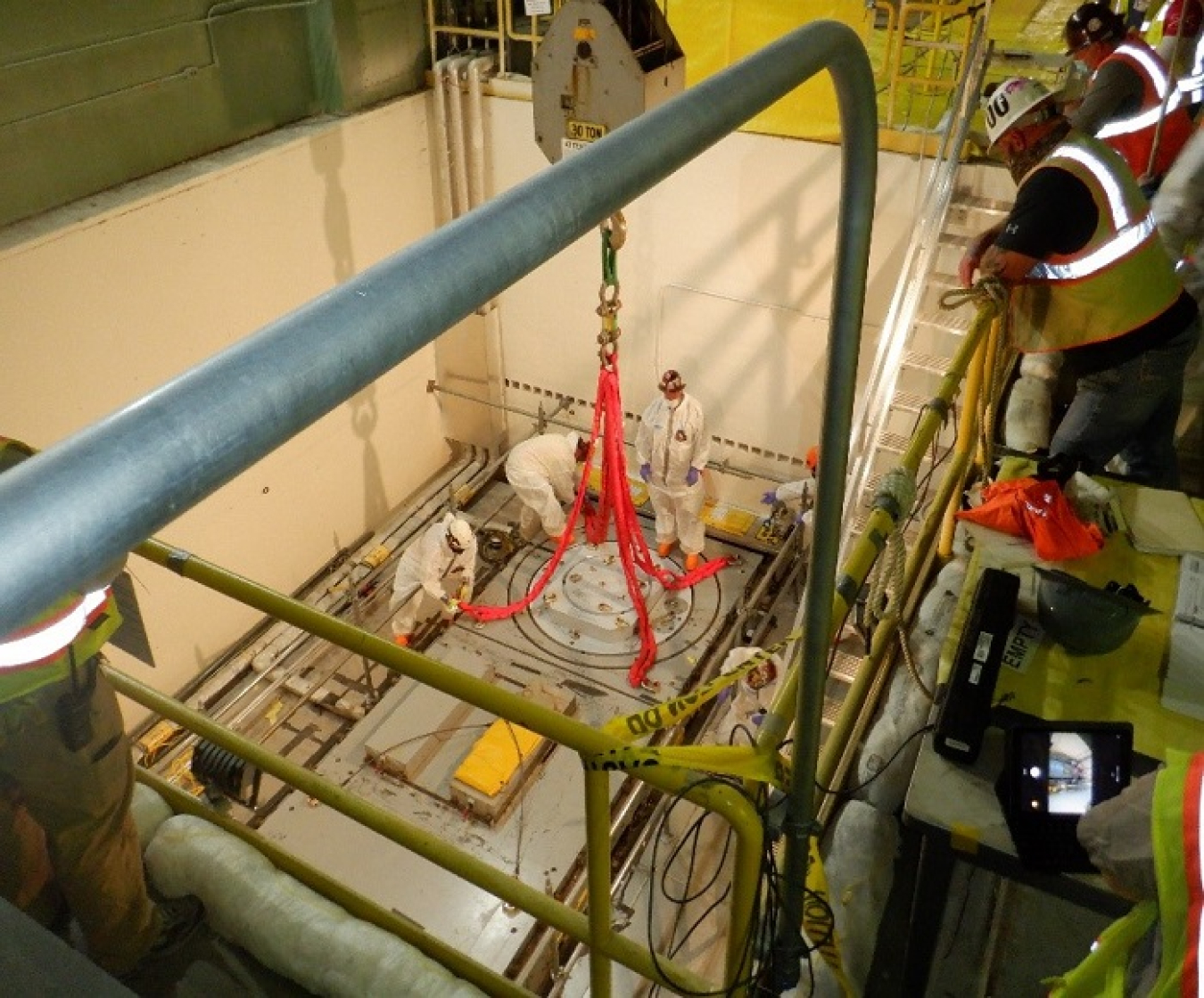 Workers are installing a new roof over a portion of the Molten Salt Reactor Experiment to ensure the facility remains safe, protected and in good condition to minimize potential risks.