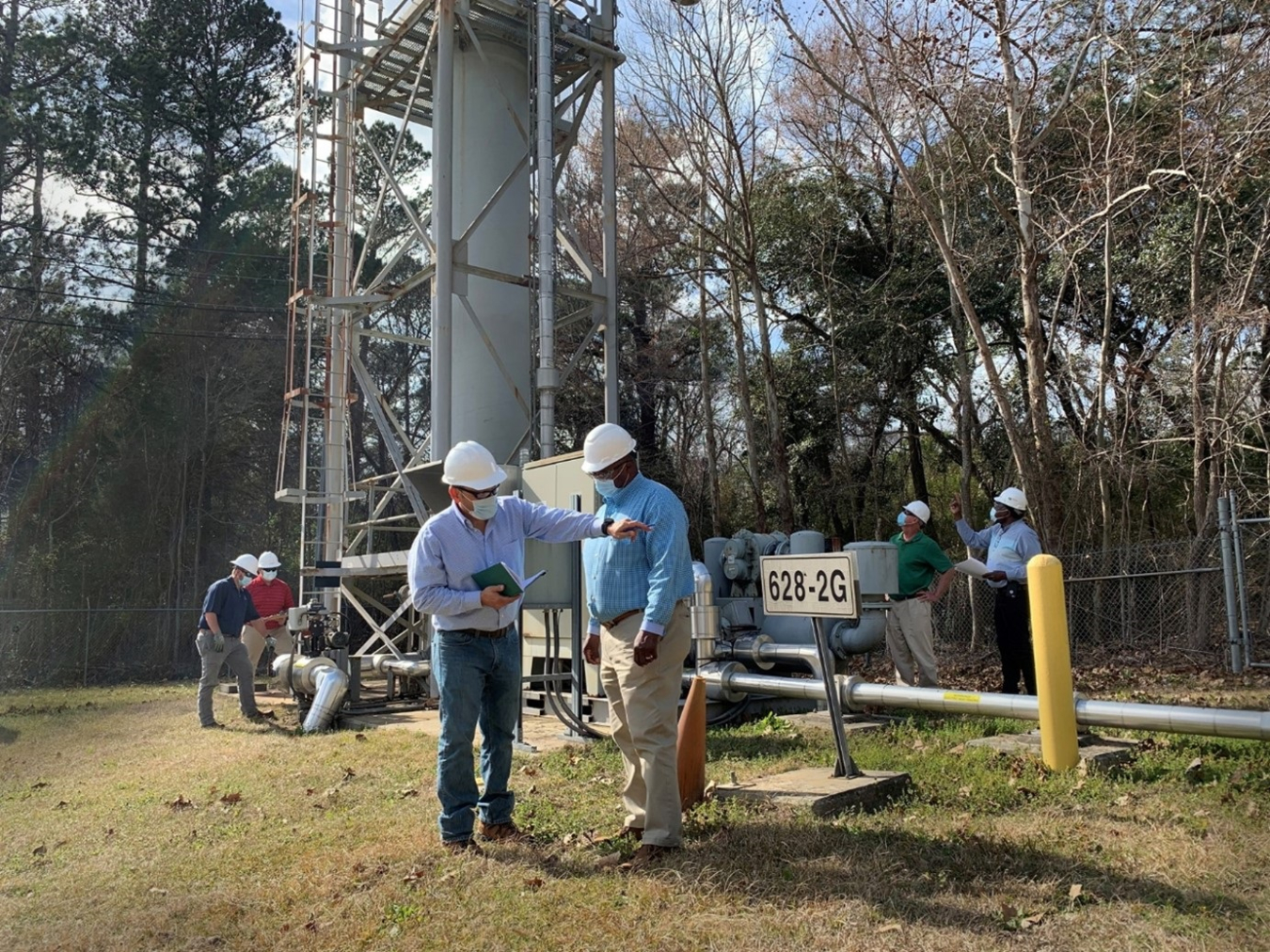 A Savannah River Nuclear Solutions project team inspects a pump-and-treat groundwater treatment system at the Savannah River Site.