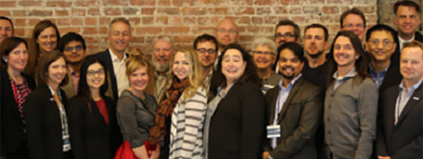 A group of people smiling.