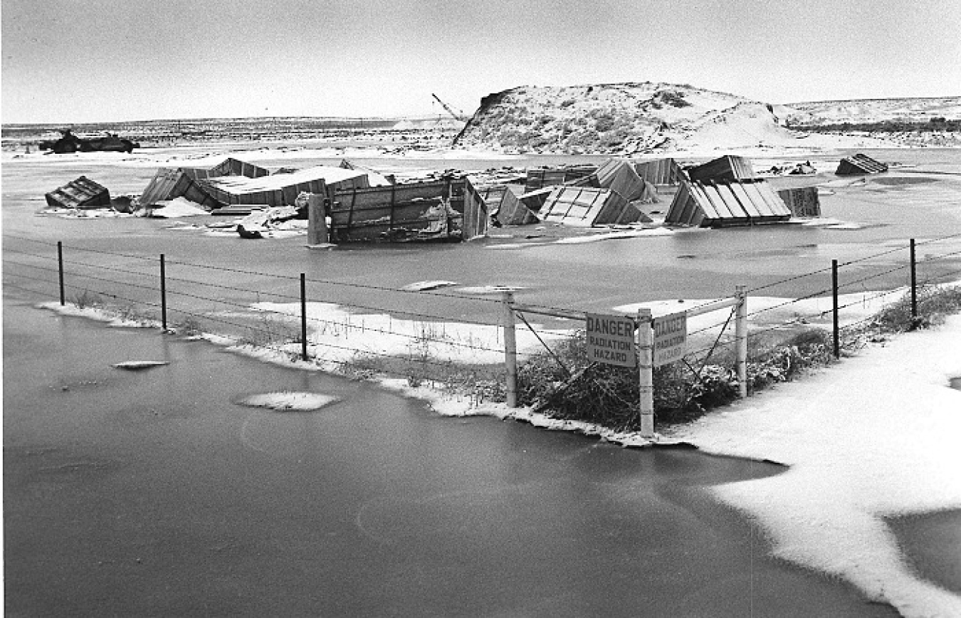 A view of a flooding event at the Idaho National Laboratory Site due to rapid snowmelt in 1969. A dike was later constructed around the Subsurface Disposal Area to channel water away from the 97-acre landfill.