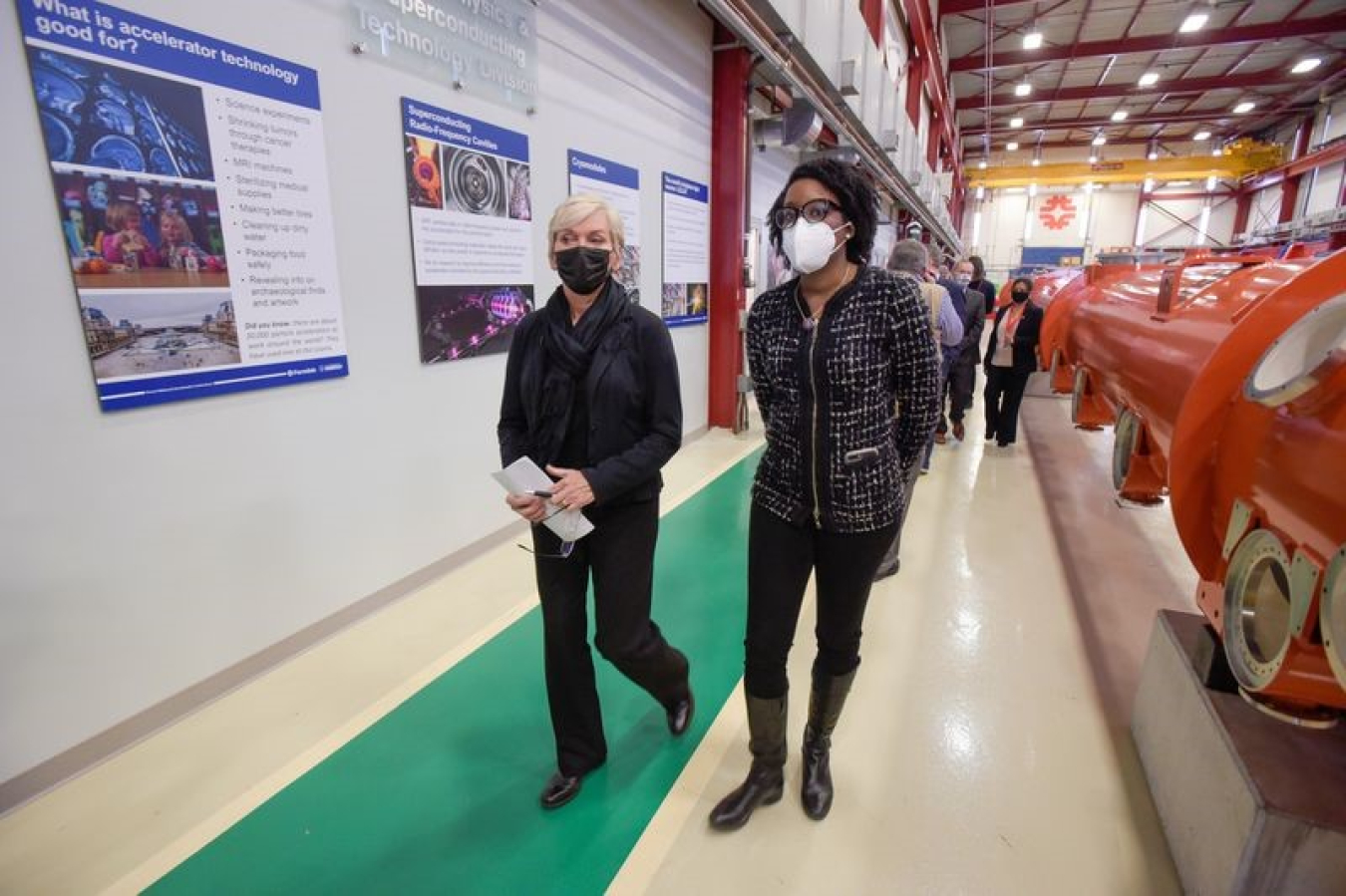 U.S. Secretary of Energy Jennifer Granholm, left, and U.S. Rep. Lauren Underwood tour Fermilab in Batavia to highlight Illinois' leadership in equitable climate action on Dec. 10, 2021