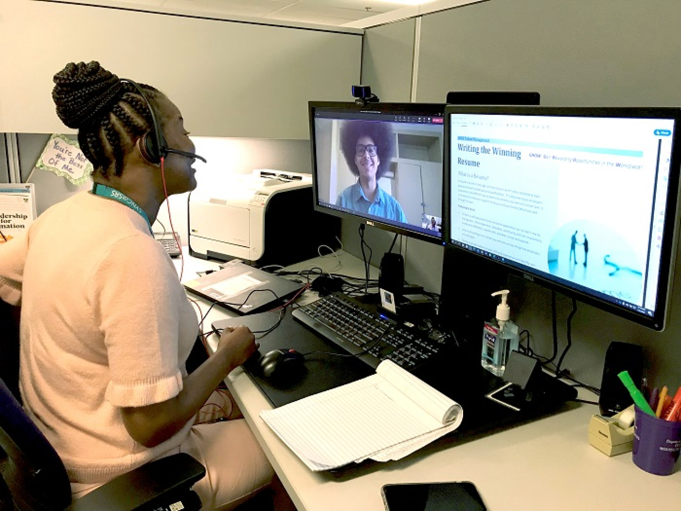 Savannah River Nuclear Solutions Talent Management Specialist Anitra McManus assists computer science engineering major Kurt Abraham, a sophomore at Claflin College.