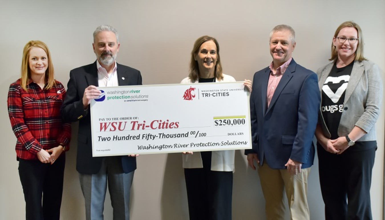 EM Office of River Protection tank operations contractor Washington River Protection Solutions (WRPS) presented a check to Washington State University (WSU) Tri-Cities to kick-start an internship cooperative.