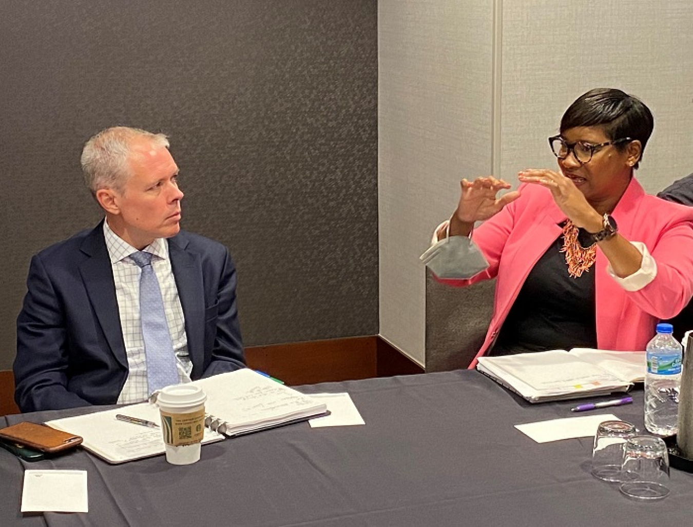 Roxanne D. Brown, international vice president at large for the United Steel Workers, speaks with EM Senior Advisor William “Ike” White during a recent Atomic Energy Workers Council meeting. 