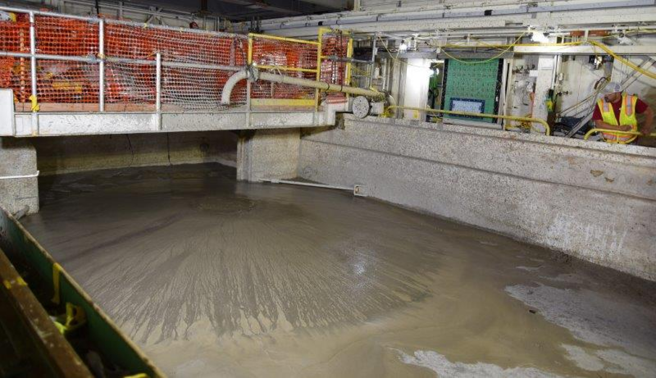 Crews recently filled the 27-foot-deep reactor pool inside Building 3010 with concrete mixture to prepare the building for demolition this fall.