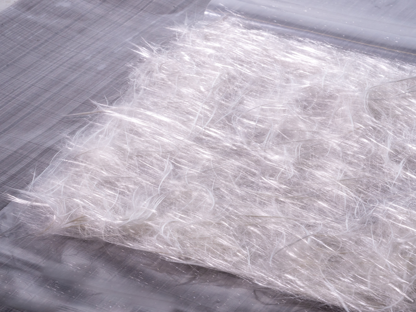 A glass fiber mat placed on the ground.