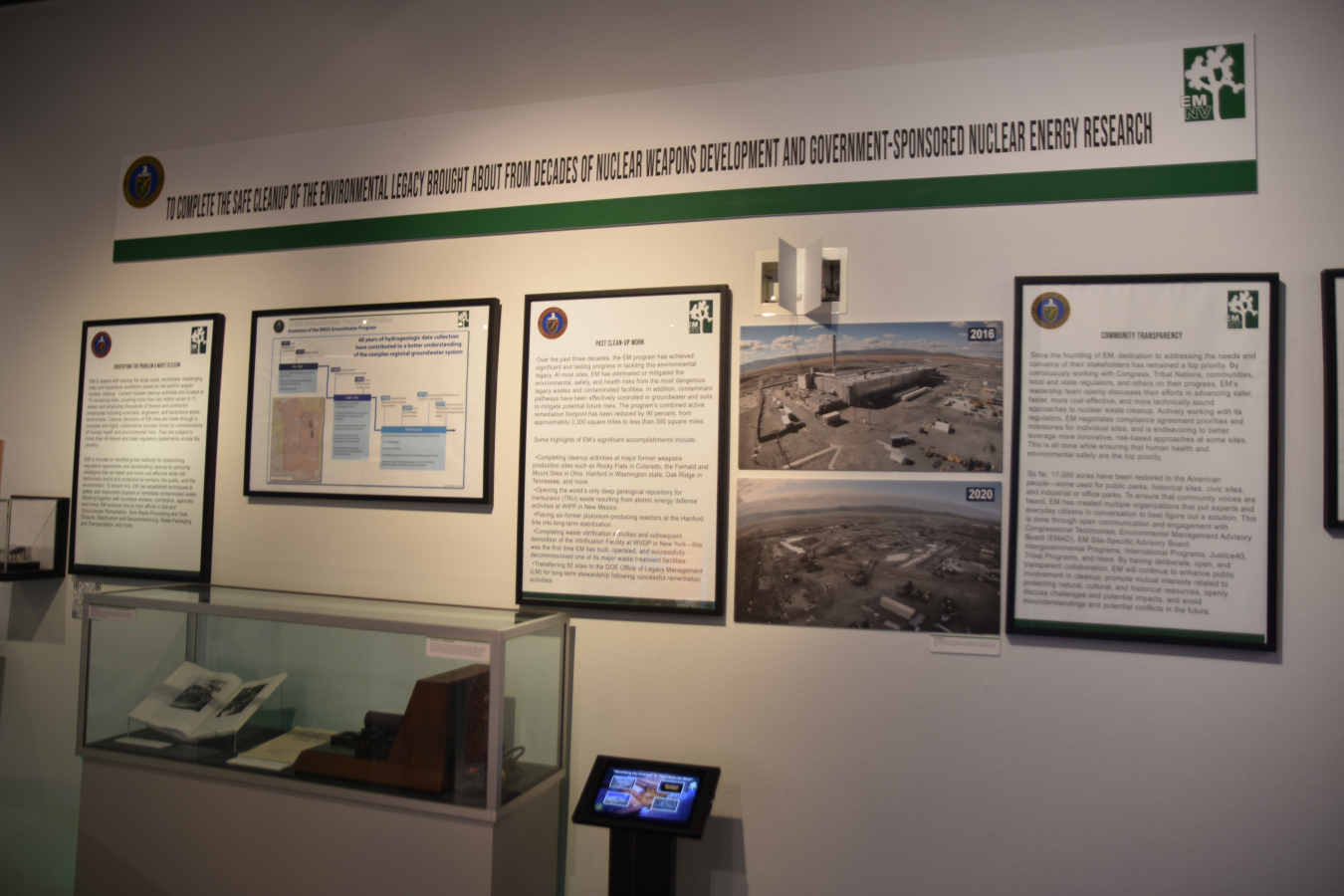 A view of a section of EM’s new exhibit at the National Atomic Testing Museum in Las Vegas that contains information about cleanup sites across the EM complex. One of the exhibit’s interactive displays can be seen in the foreground. 