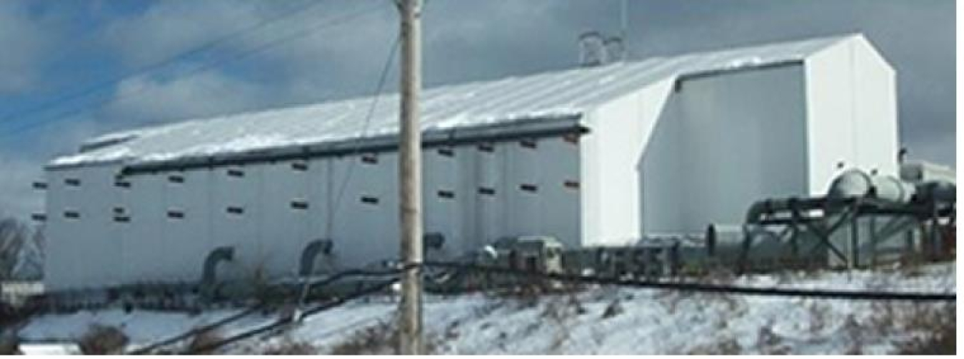 Workers finished building a tent enclosure over Building H2 in 2012.