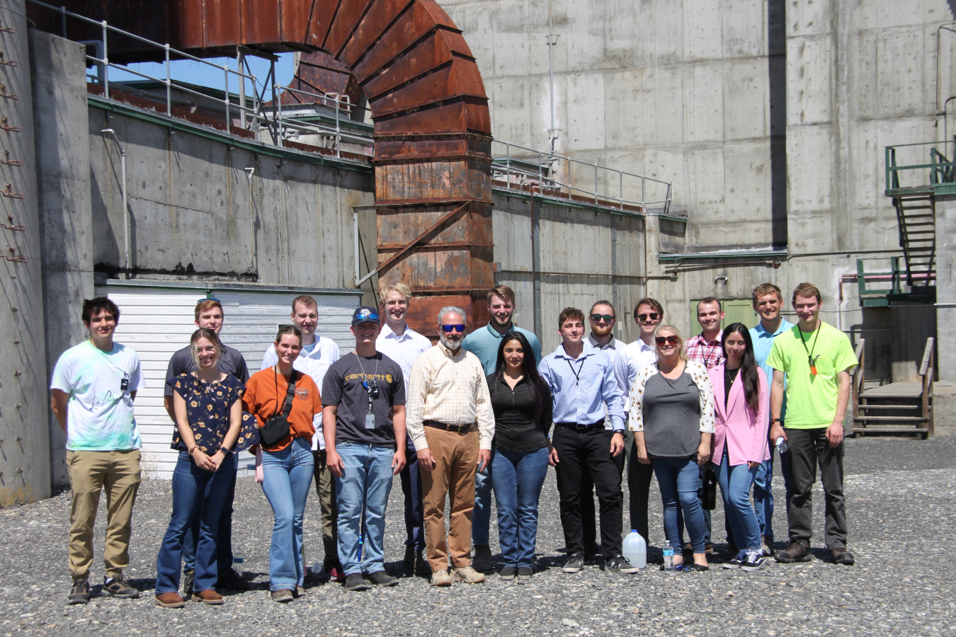 Central Plateau Cleanup Company President John Eschenberg, center, welcomes this year’s summer interns and cooperative education program students to the historic B Reactor on the Hanford Site. 