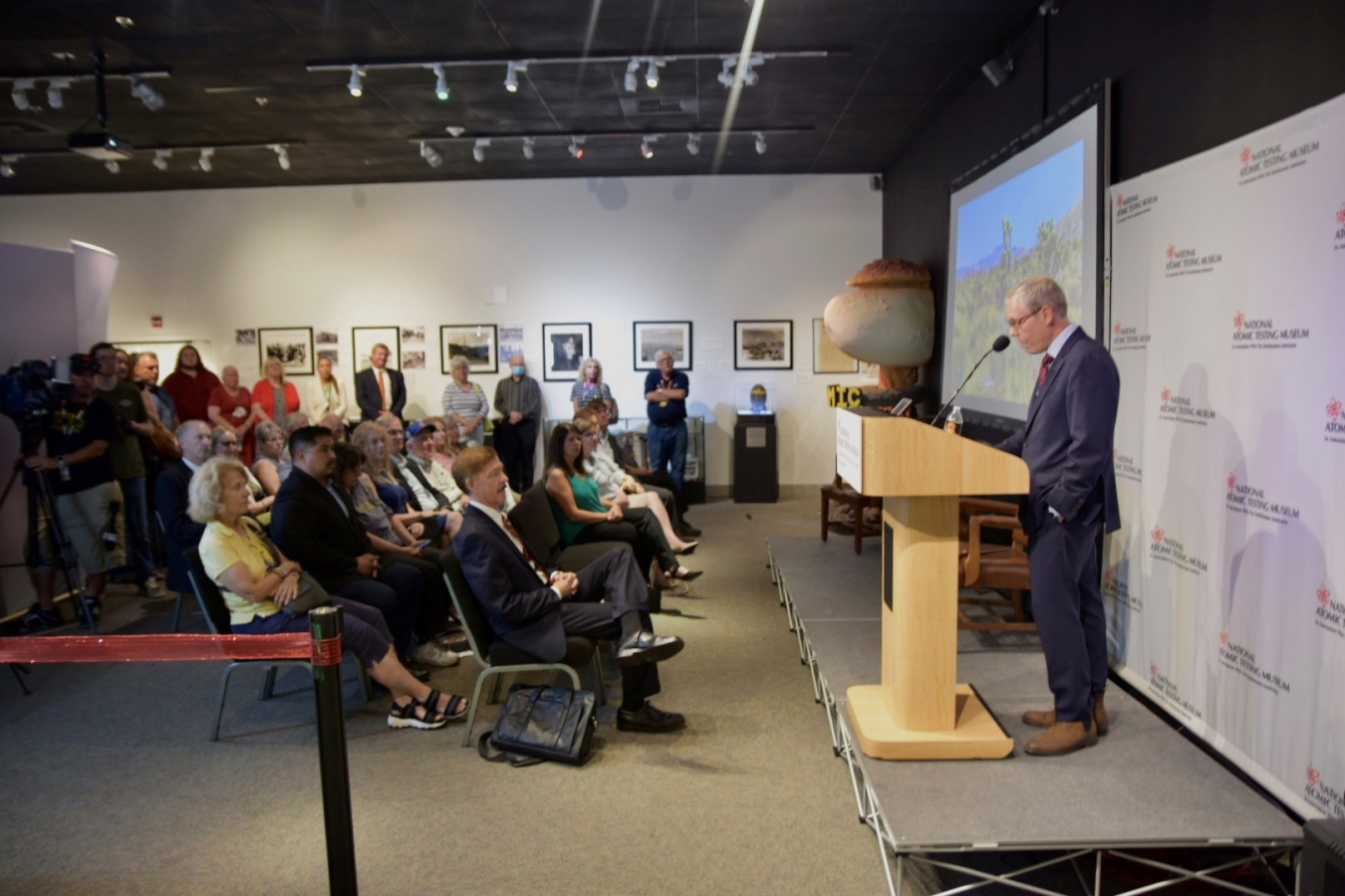 EM Senior Advisor William "Ike" White speaks during a ceremony to mark the opening of a new EM exhibit at the National Atomic Testing Museum in Las Vegas on Aug 2.