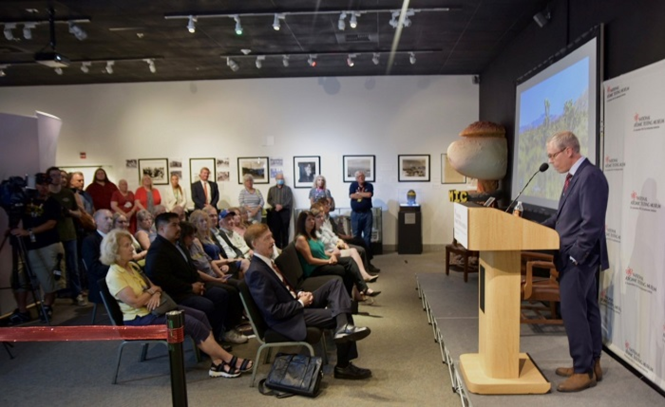 About 60 people attended the unveiling of EM's new permanent exhibit at the National Atomic Testing Museum in Las Vegas on Aug 2. Here, EM Senior Advisor William "Ike" White speaks during the ceremony.