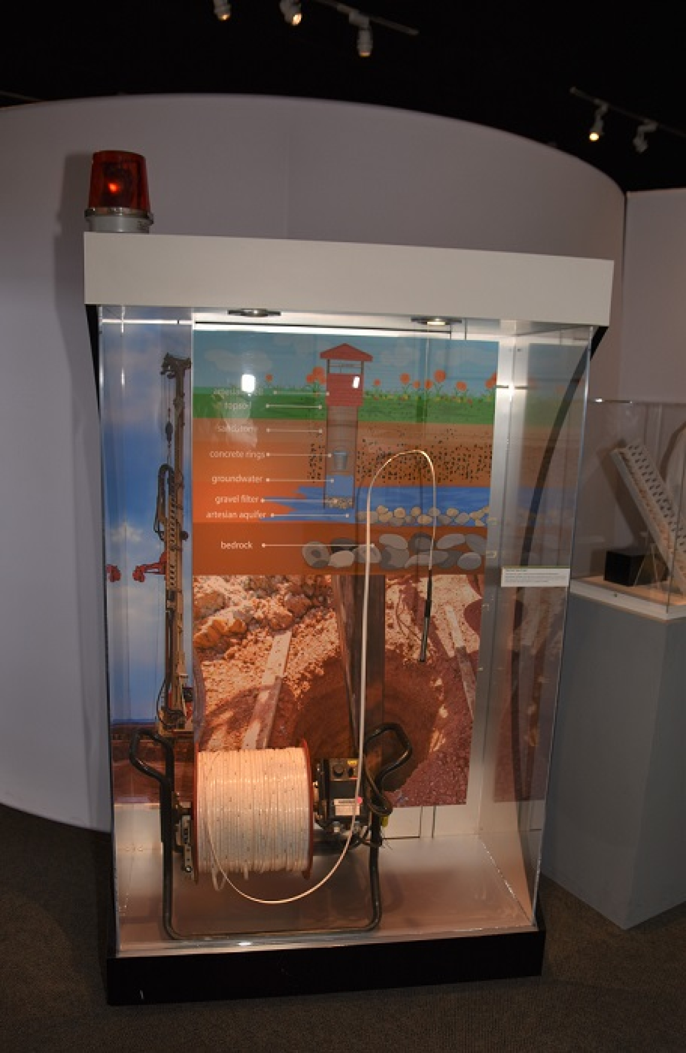 The EM Nevada Program contributed to EM's new exhibit at the National Atomic Testing Museum. Pictured is a spool of electronic e-tape, used in well drilling, well development, groundwater sampling and water level monitoring processes. It is lowered into a well and provides an audible signal when in contact with water or other fluid. A measurement is then taken from the tape at the top of the well casing or opening. When fully extended, this spool reaches a depth of 2,500 feet.