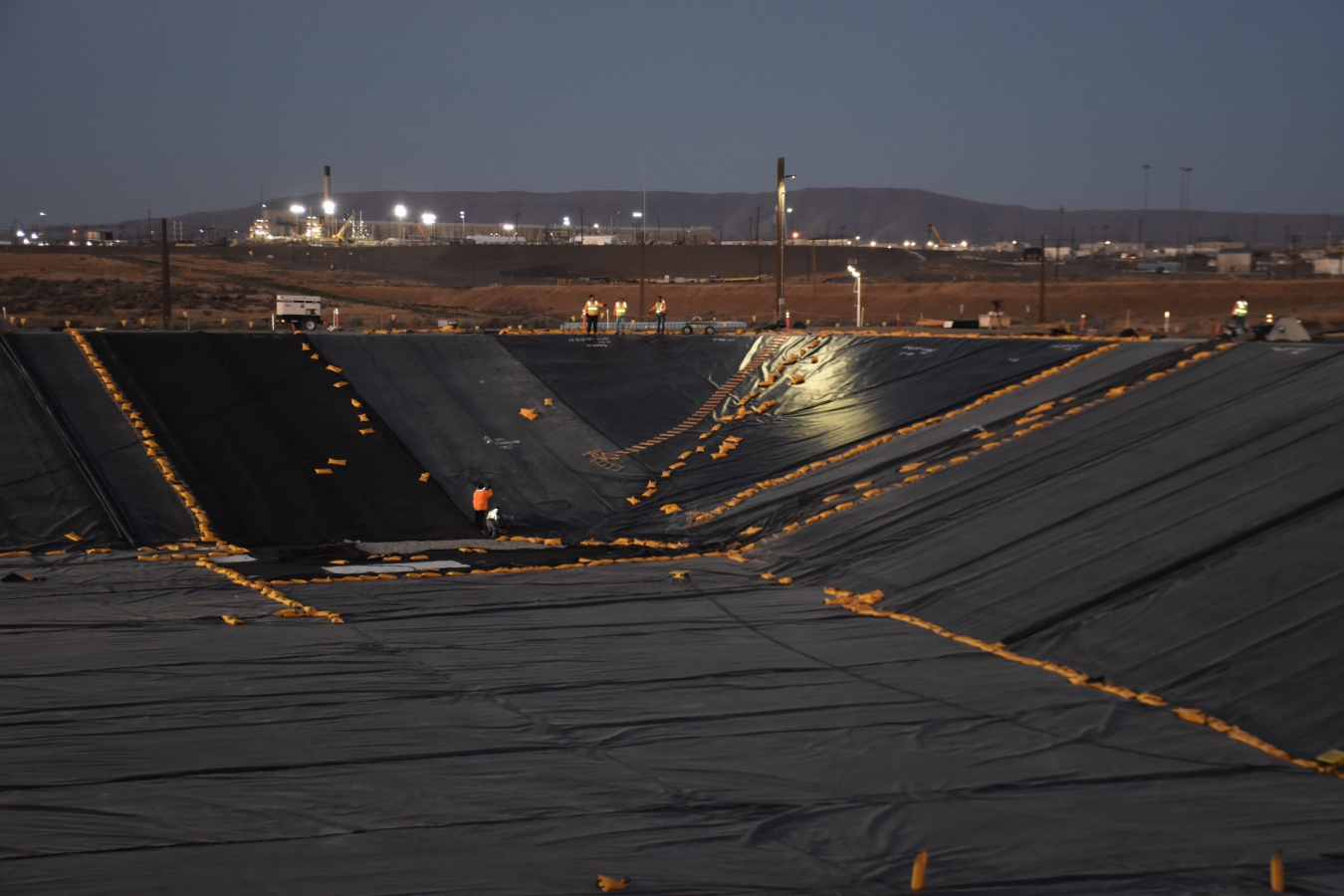 Crews with Washington River Protection Solutions work on the second of two liner systems at Liquid Effluent Retention Facility Basin 41 on the Hanford Site.