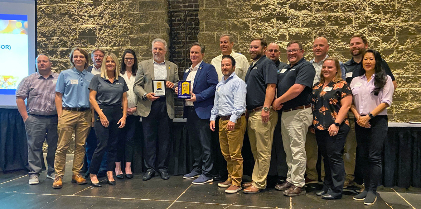 Members of UCOR’s management team receive the “Top Workplaces” award from the Knoxville News Sentinel. In its first year participating in the awards program, the contractor placed second among the region’s large businesses.