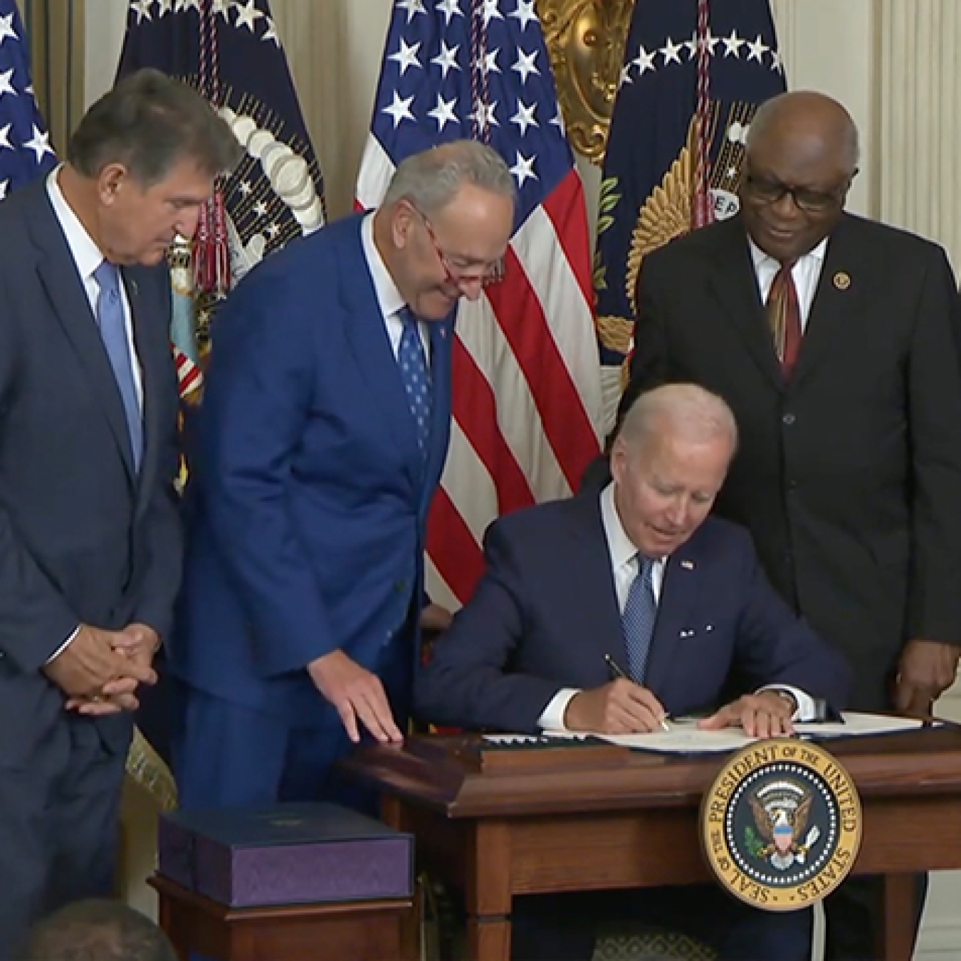 President Joe Biden signs the Inflation Reduction Act on August 19, 2022.