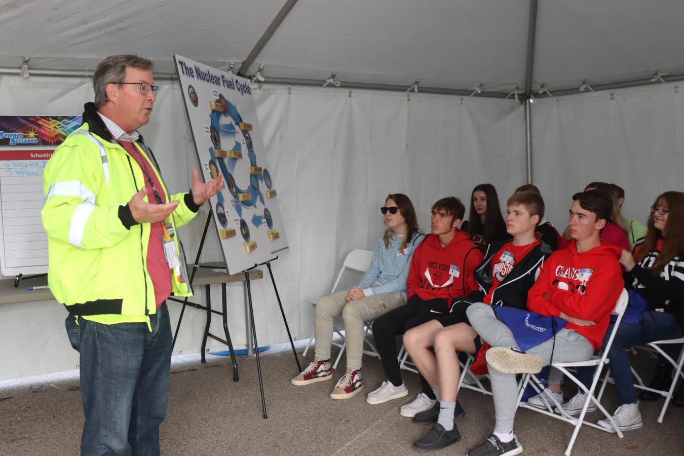 EM Portsmouth/Paducah Project Office Federal Project Director Jud Lilly discusses the nuclear fuel cycle with students at one of 14 science stations at the newly relaunched Science Alliance.