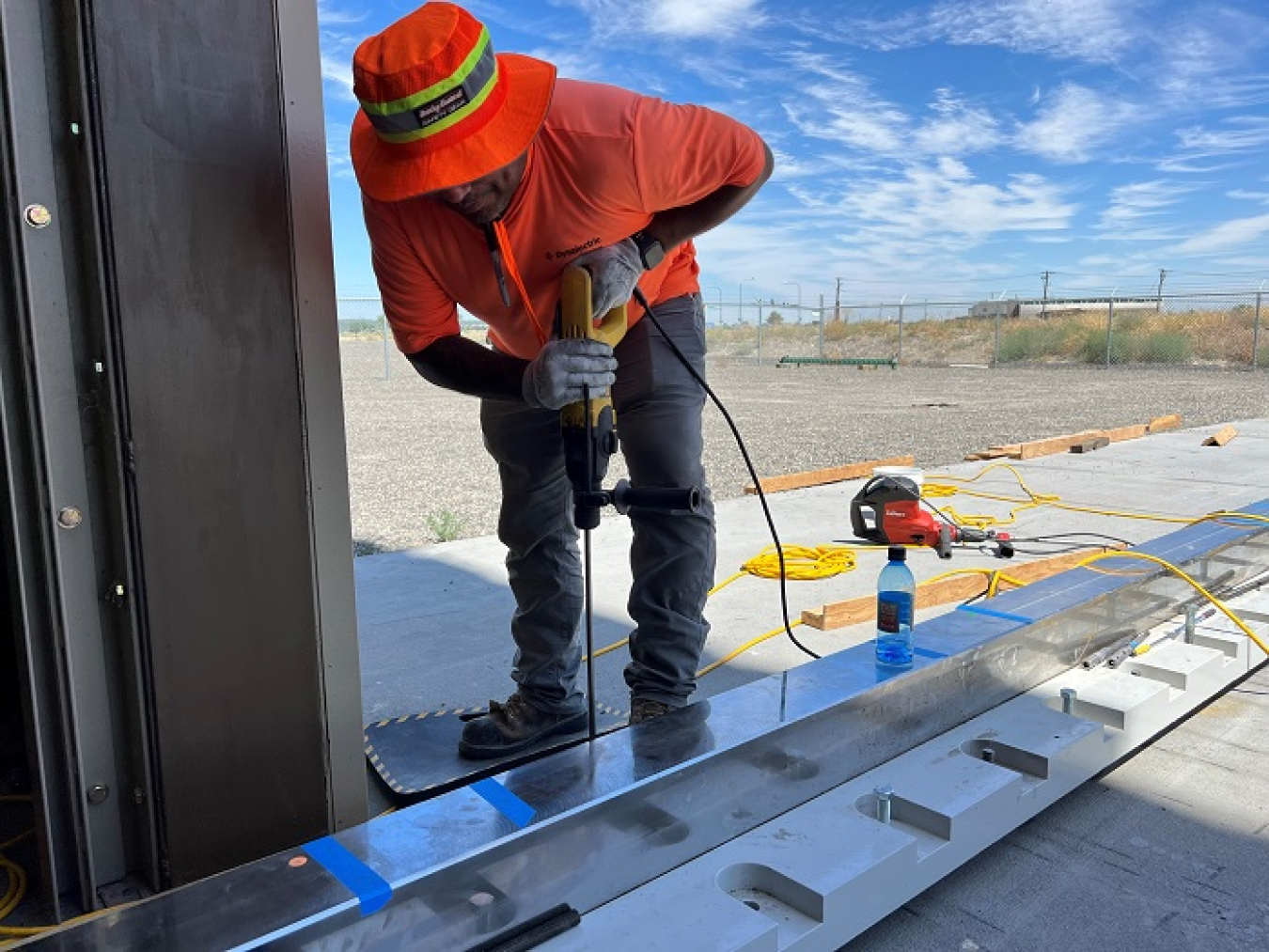 Vince Bass, journeyman carpenter with subcontractor Fowler General Construction, installs one of two rails at the Low-Activity Waste Melter Assembly, Storage and Transportation facility in Richland, Washington, near the Hanford Site. 