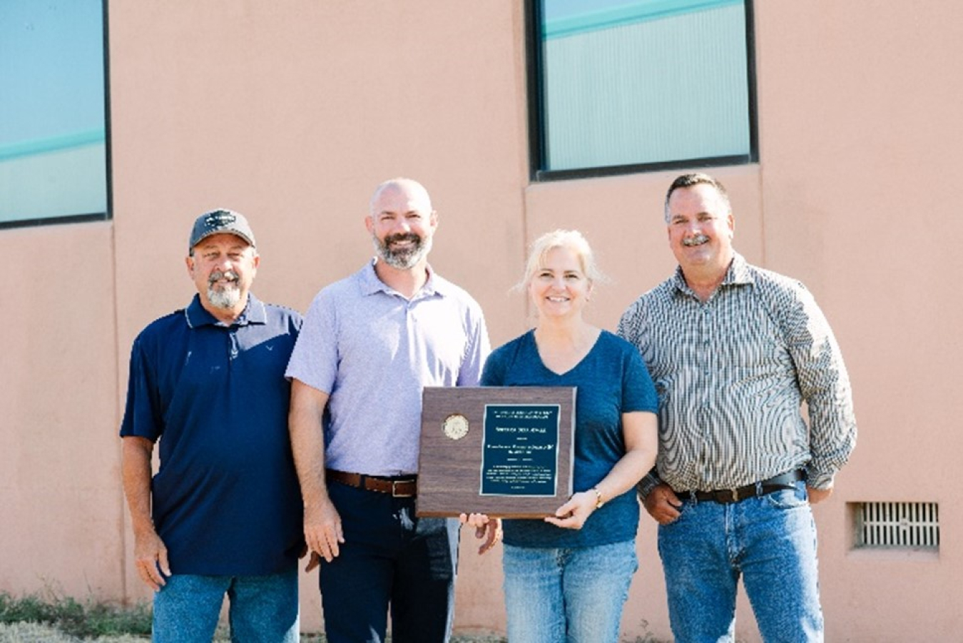 Pictured from left: Rick Ennis, Hanford Atomic Metal Trades Council safety representative; Garrett Knutson, Hanford Laboratory Management and Integration (HLMI) Environmental Health & Safety manager; Kristine Bowen, HLMI Voluntary Protection Program coordinator; and Ron Tucker, HLMI facility operations manager.