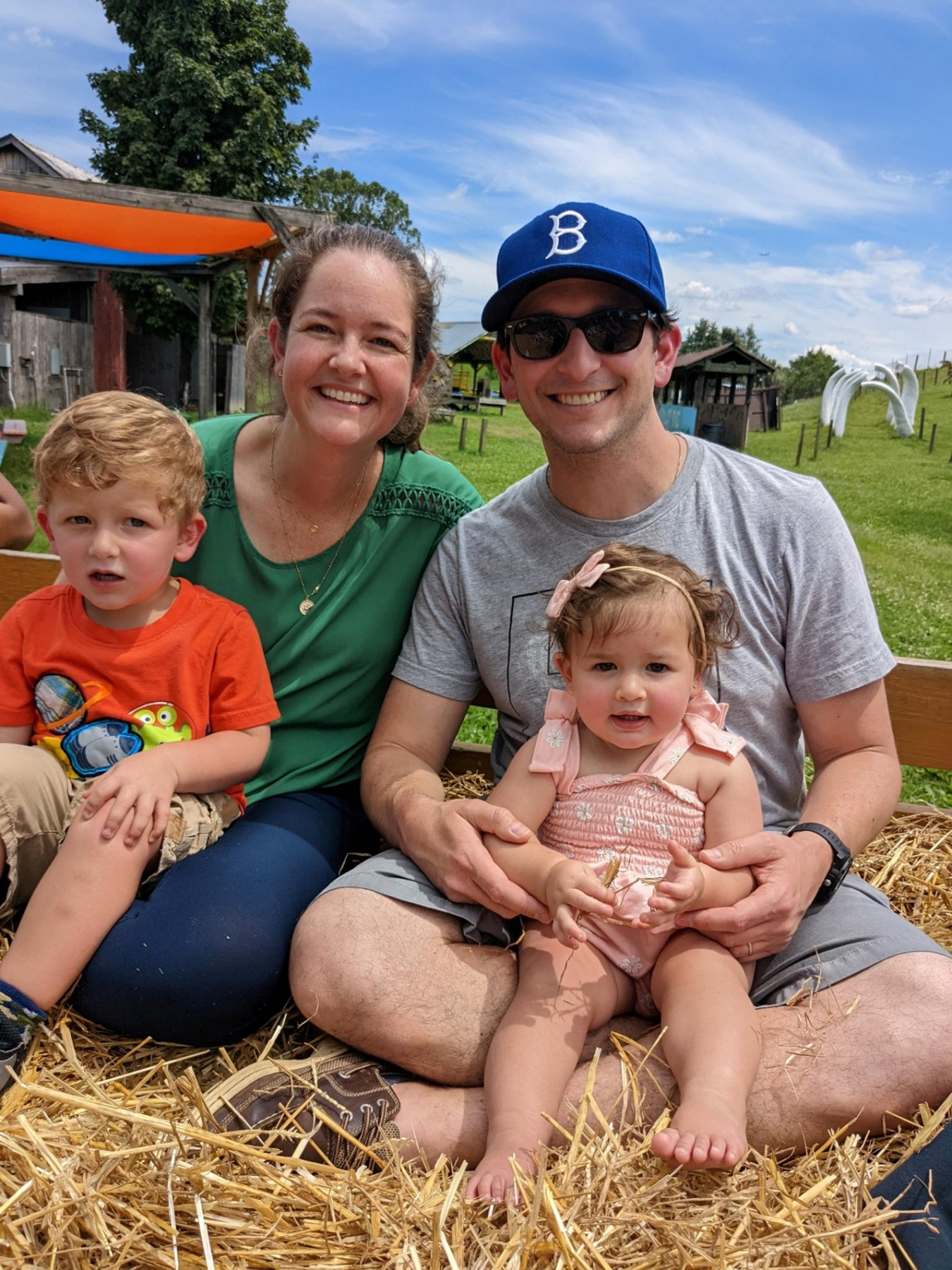 Dr. Nina Rodriguez, her husband, and her young son and daughter outside.