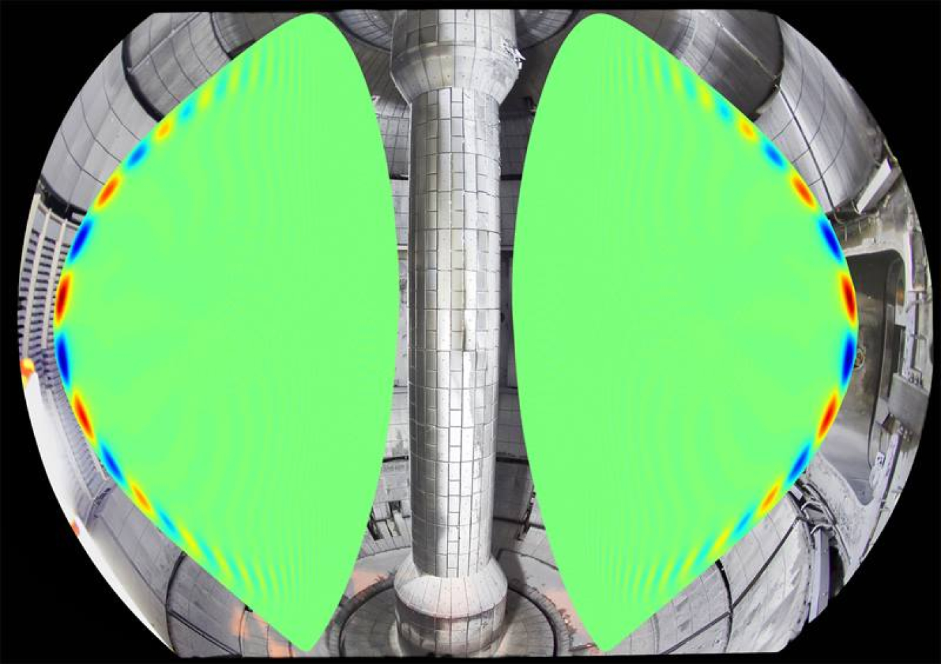 The structure of a plasma instability as calculated using a numerical simulation, shown inside a photo of the National Spherical Torus Experiment. This plasma instability is associated with explosive energy bursts that can damage the reactor vessel.