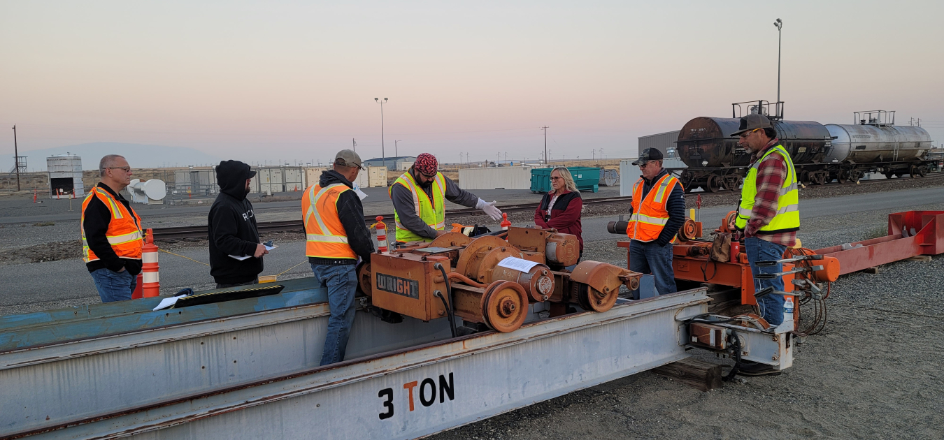 Fieldwork supervisors conduct a prejob brief at the Volpentest HAMMER Federal Training Center on the Hanford Site, where crews will practice repairs to an overhead crane before conducting the work in Hanford’s 324 Building.