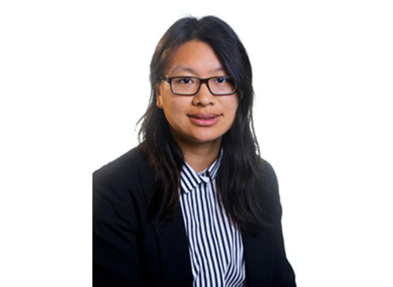 Headshot of a young woman wearing glasses, a black blazer, and a striped shirt