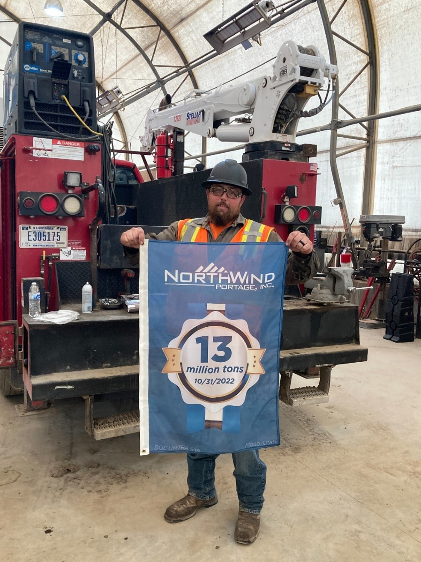 Mechanic Michael Brandenburg is a member of the crew that helped the Moab Uranium Mill Tailings Remedial Action Project achieve the milestone of relocating 13 million tons of uranium mill tailings to the Crescent Junction, Utah, disposal cell.