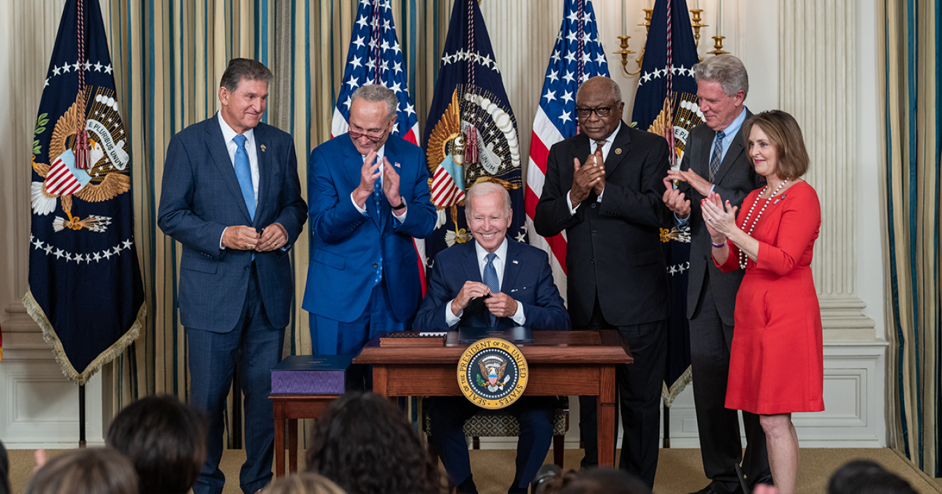 President Joe Biden signs the Inflation Reduction Act into law. 