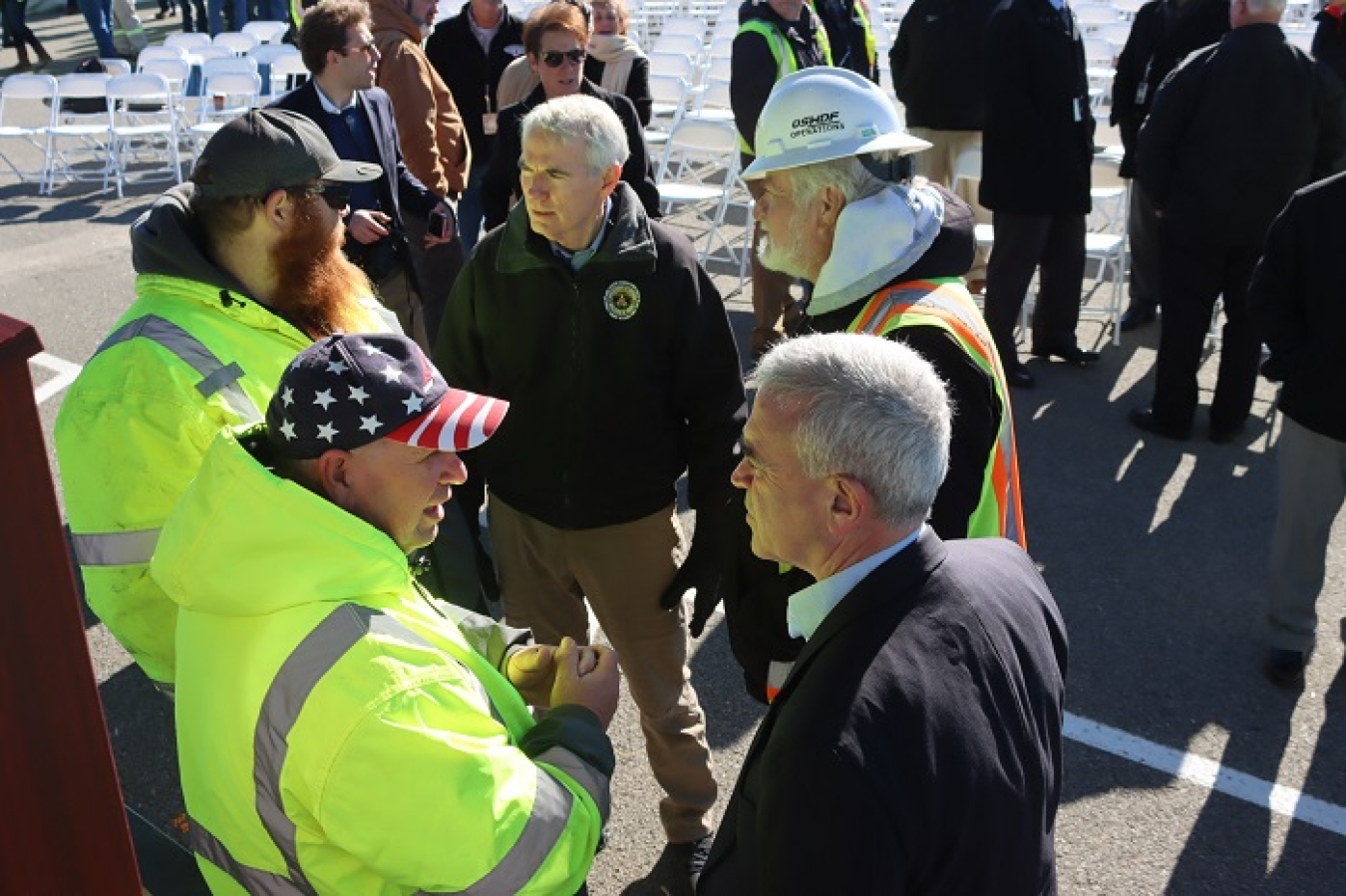 Sen. Rob Portman, at center, and Rep. Brad Wenstrup, at bottom right, speak to site employees following the recent Past, Present, Future Celebration at the Portsmouth Site.