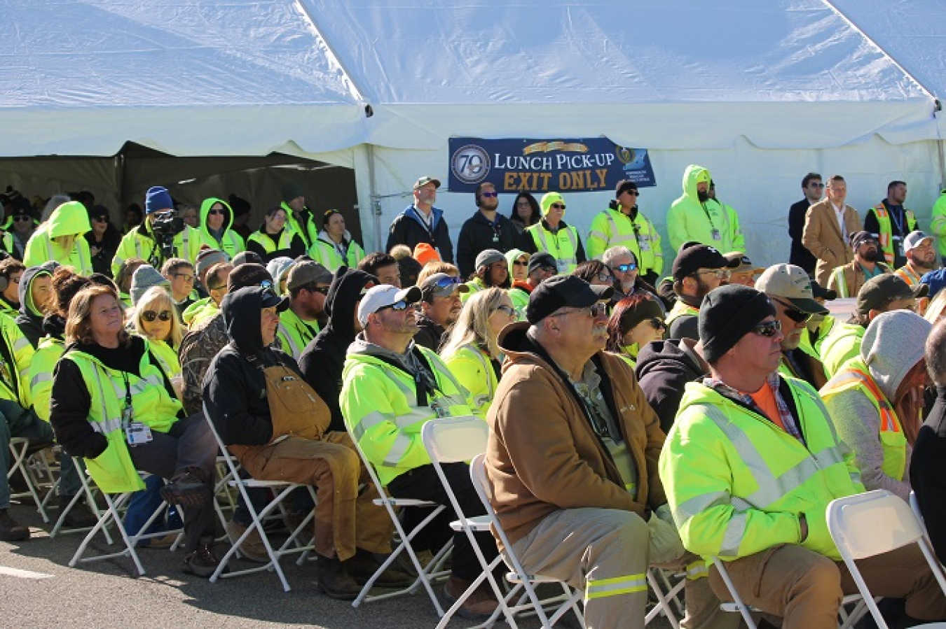 Portsmouth Site employees and other attendees of the site's Past, Present, Future Celebration listen to speakers at the event, including EM Senior Advisor William "Ike" White, Sen. Rob Portman and several others.