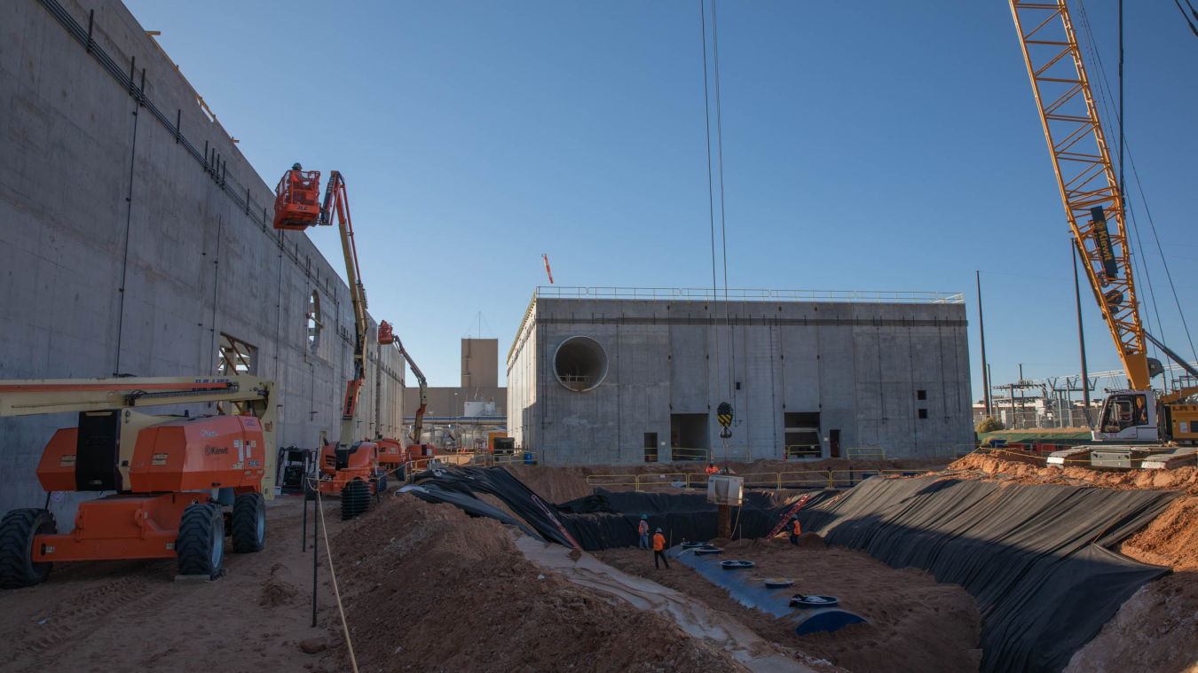 Construction on the Safety Significant Confinement Ventilation System at the Waste Isolation Pilot Plant continues to progress, including excavation for tanks and piping, as seen here outside of the Salt Reduction Building recently.