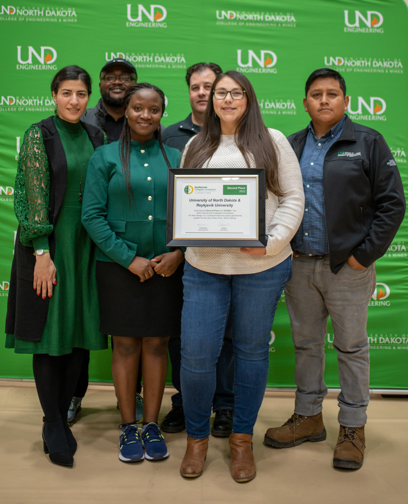 L-R: Moones Alamooti, Nnaemeka Ngobidi, Chioma Onwumelu, Shane Namie, Jessica Eagle-Bluestone, and Jerjes Porlles from team UND Geothermal Vision pose with their GCC certificate.