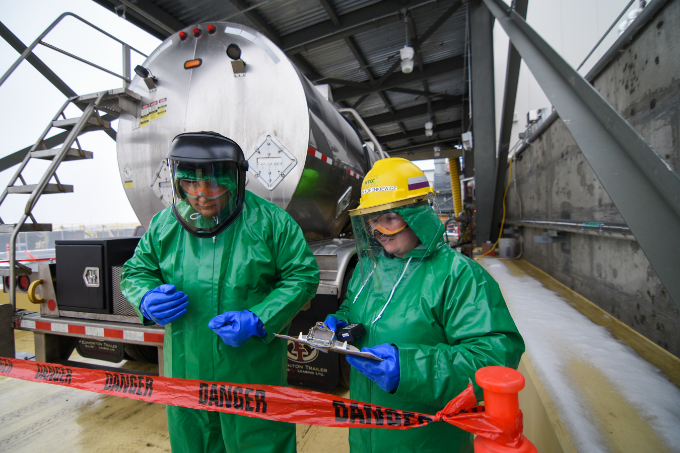 Waste Treatment and Immobilization Plant Commissioning Technicians Jonathan Gutierrez, left, and Miranda Korenkiewicz perform a test run for receiving a chemical at the plant’s Effluent Management Facility on the Hanford Site.