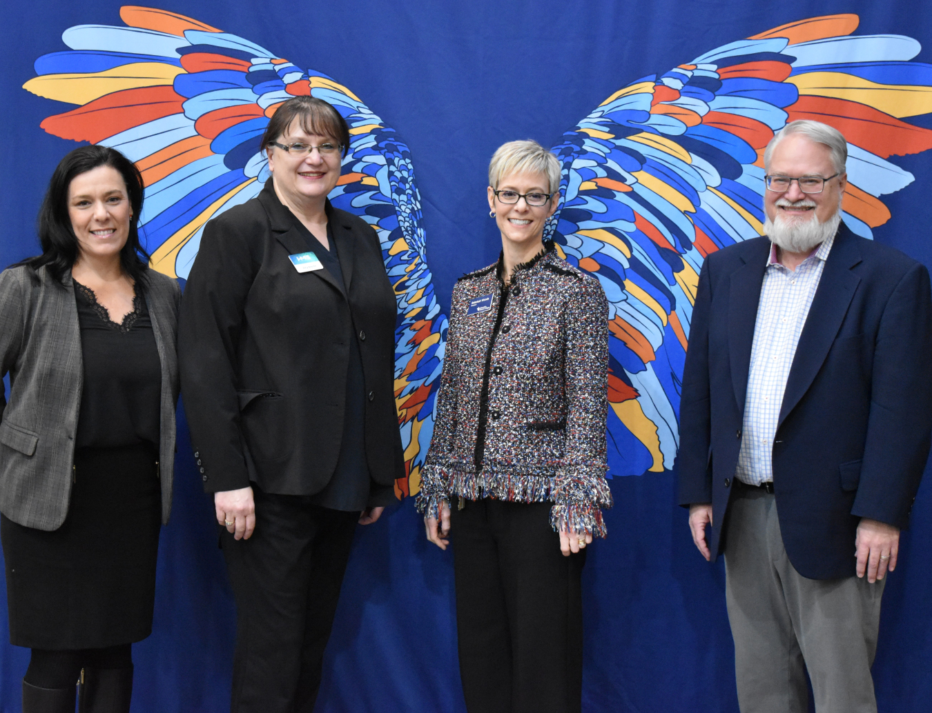 Hanford Mission Integration Solutions Vice President of Workforce Solutions Julie Lindstrom, far left, and Chief Operations Officer Amy Basche, center left, presented a $150,000 donation to Columbia Basin College representatives President Rebekah Woods, center right, and Vice President of Instruction Michael Lee for a program that helps students find career pathways to the Hanford Site.