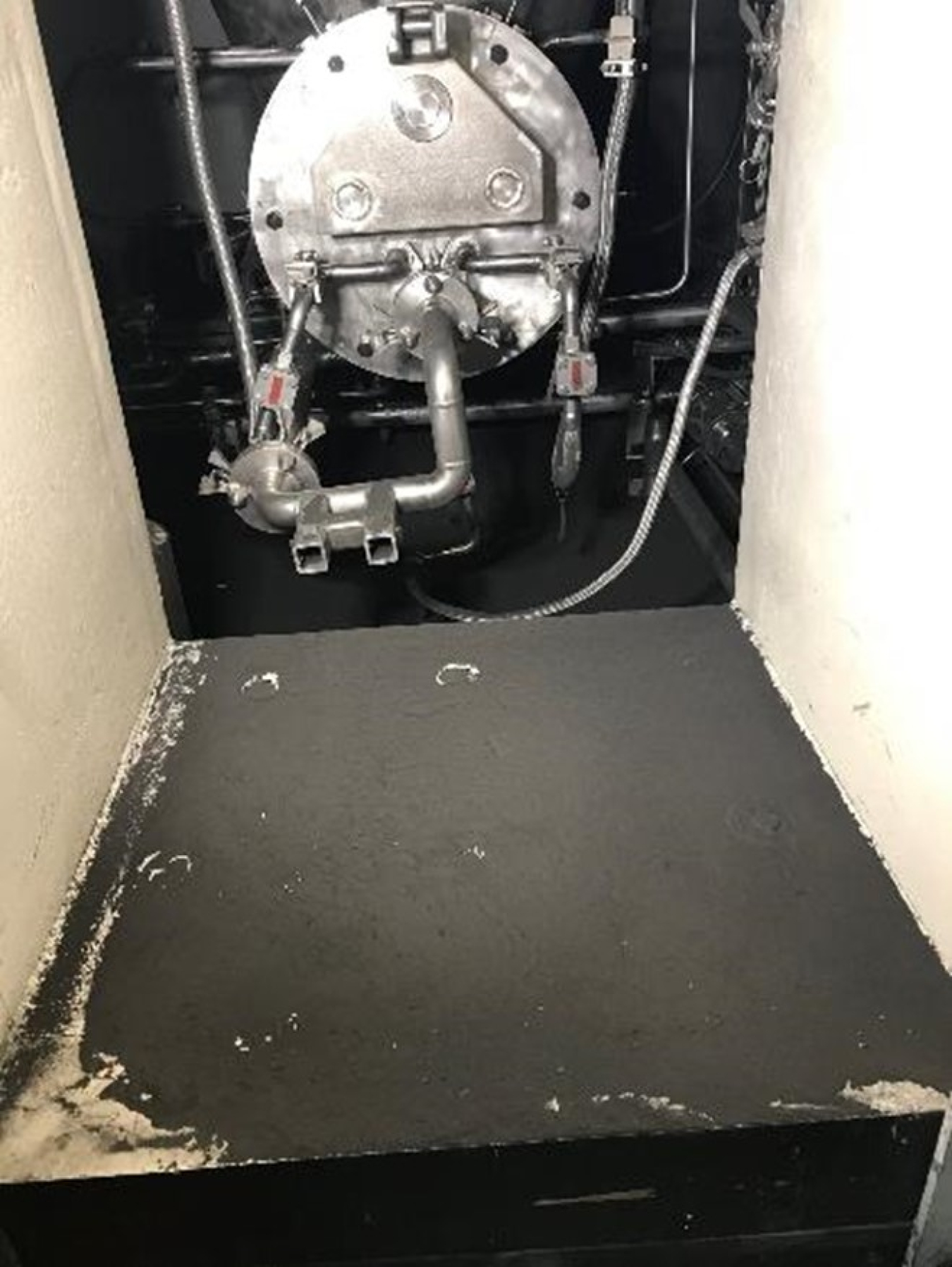 The non-radioactive, non-hazardous sand-like material shown in the lower left corner leaked into a cell of the Integrated Waste Treatment Unit. The source of the leak has been identified and crews will make repairs and return the plant to operational condition