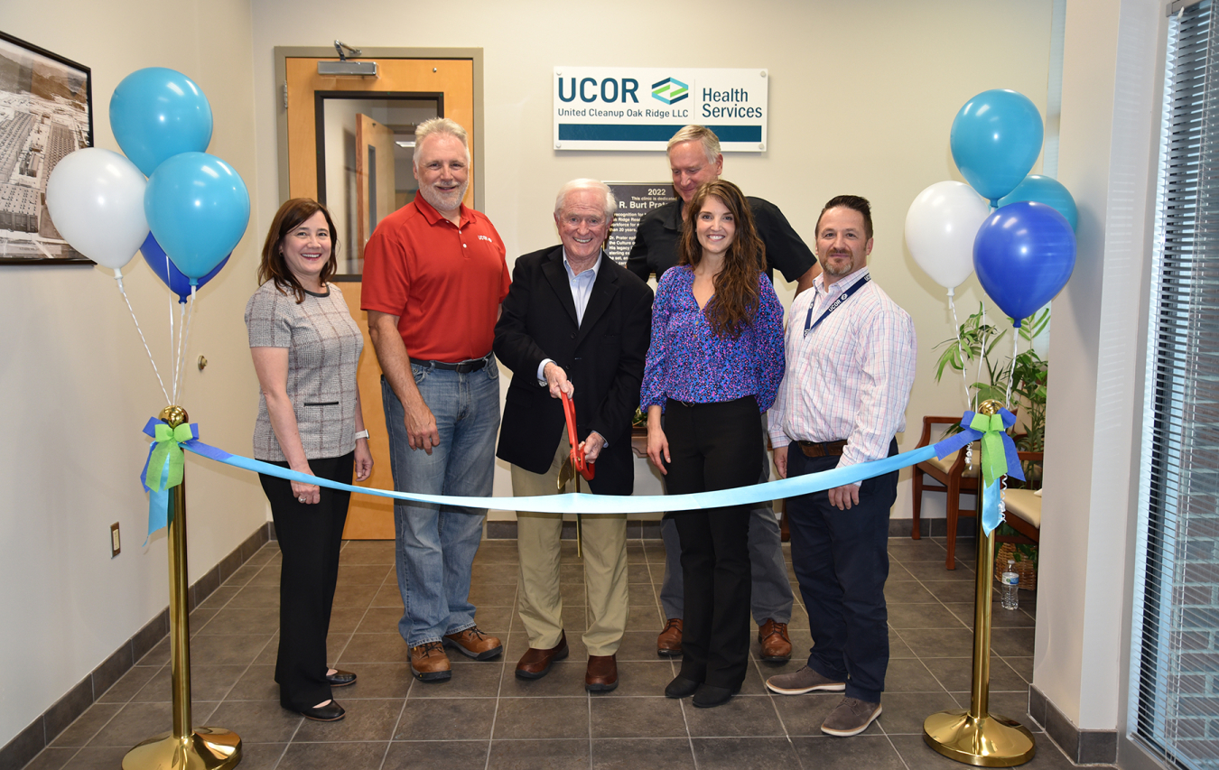 Officials celebrate the opening of a newly expanded health services clinic on the Oak Ridge Reservation with a ceremonial ribbon cutting ceremony. From left: Laura Wilkerson, Oak Ridge Office of Environmental Management deputy manager; Ken Rueter, UCOR president and CEO; Dr. Burt Prater, former UCOR health services director; Dr. Grant Shirley, UCOR health services director; Stephanie Miller, safety systems and services integration manager; and Clint Wolfley, UCOR chief safety officer.