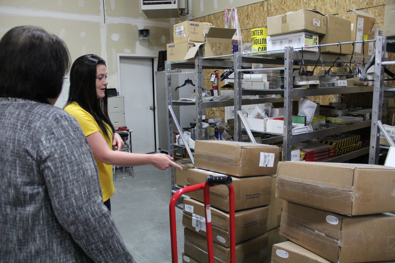 Ashley Quiroz, owner of Idaho Falls-based Eagle Rock Specialties, discusses the company’s inventory with Idaho Environmental Coalition Manager Shawna Southwick.