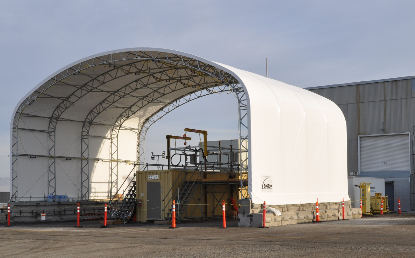 Outside the K West Reactor, crews are installing equipment that will pump out and filter water from the reactor’s 1.2 million-gallon basin. Workers will transport the contaminated water by trucks to Hanford’s Effluent Treatment Facility for processing and disposal.