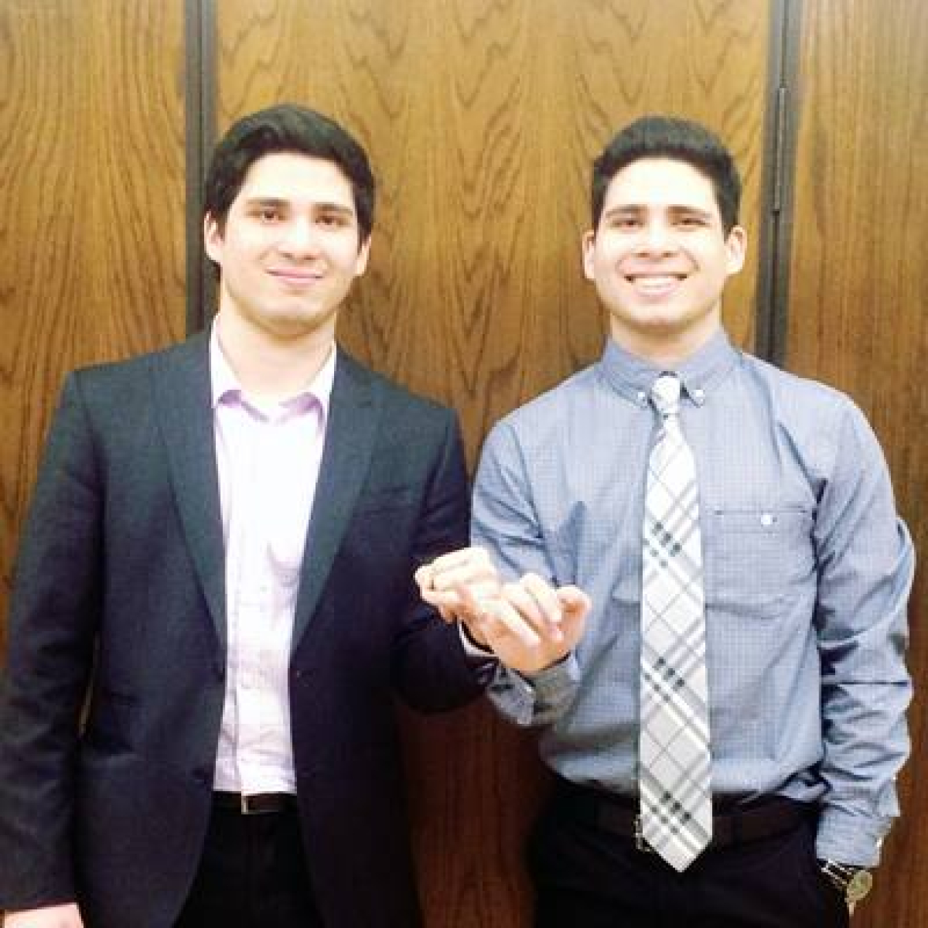 Pierre (on right) with his twin brother receiving their rings for the Order of the Engineer oath during their senior year of college