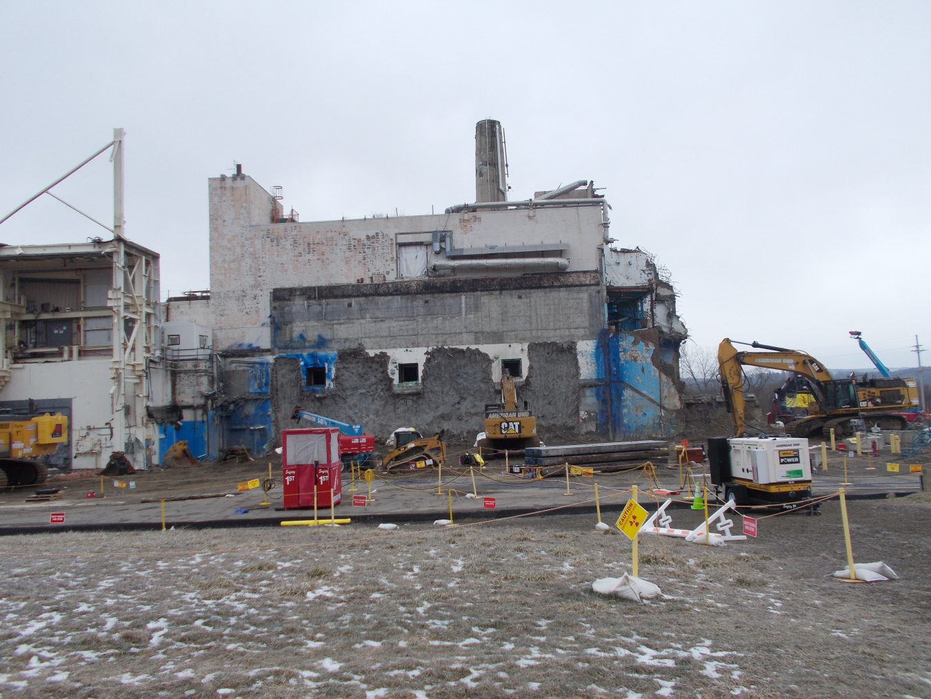 EM workers safely removed three shield windows with a combined weight of 75,675 pounds from the Main Plant Process Building at the West Valley Demonstration Project. The windows allowed workers to see inside a former reprocessing cell while working remotely. The side of the Main Plant building frame where the windows were located is pictured.