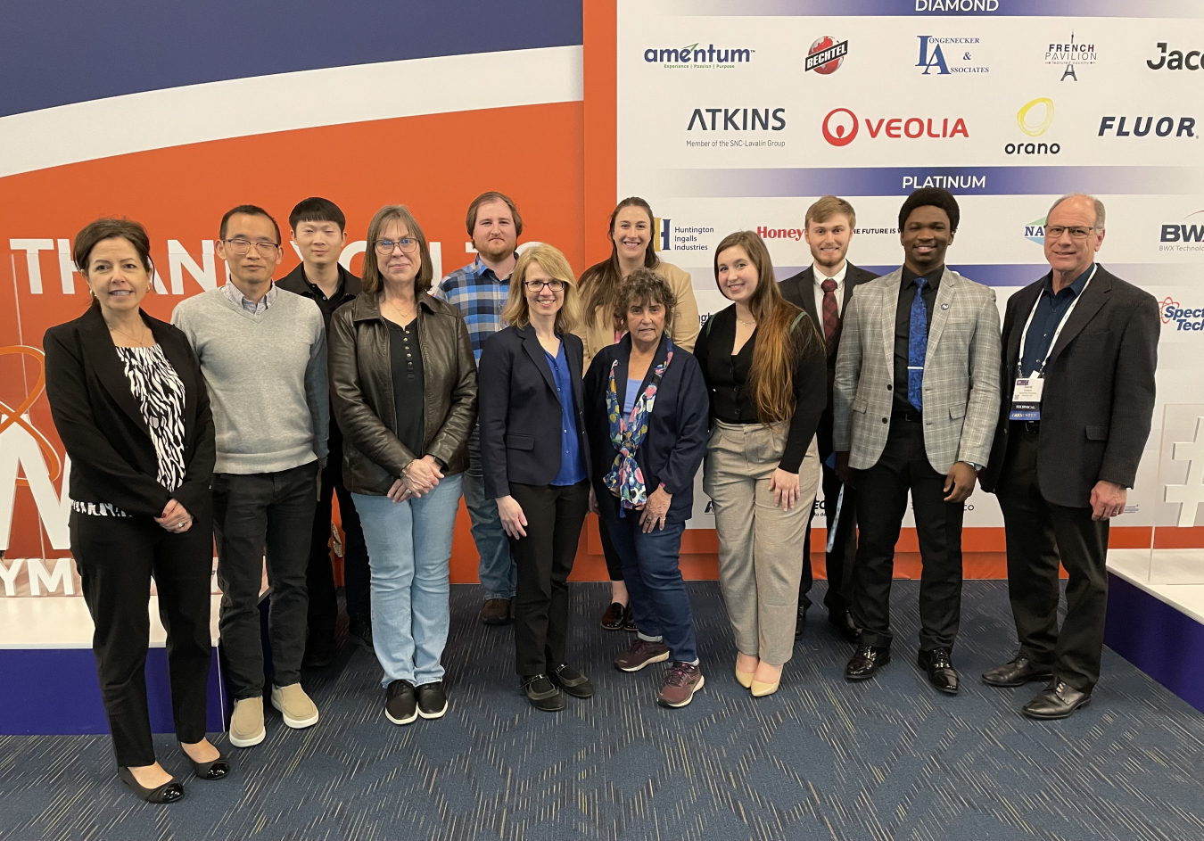 – EM Intergovernmental and Stakeholder Programs Director Joceline Nahigian and others with the cleanup program connected with student and faculty researchers representing the multi-university Consortium for Risk Evaluation with Stakeholder Participation during the 2023 Waste Management Symposia. 