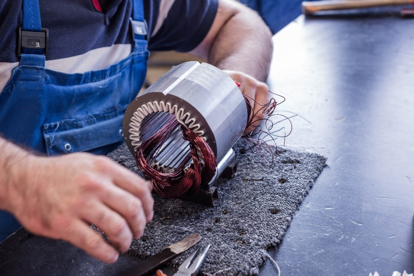 Electrician working on an electric motor.