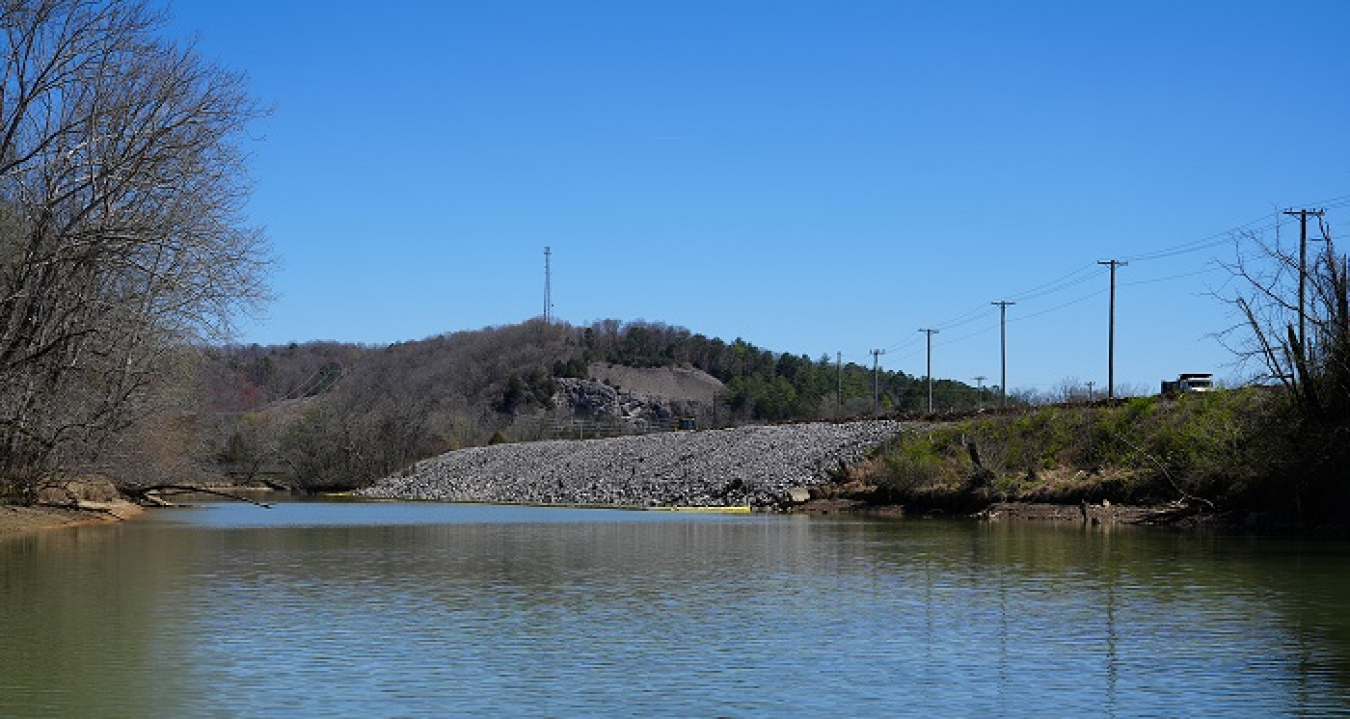 A view of the Poplar Creek shoreline area where crews have finished removing transite material and placing riprap to prevent erosion until vegetation is reestablished.