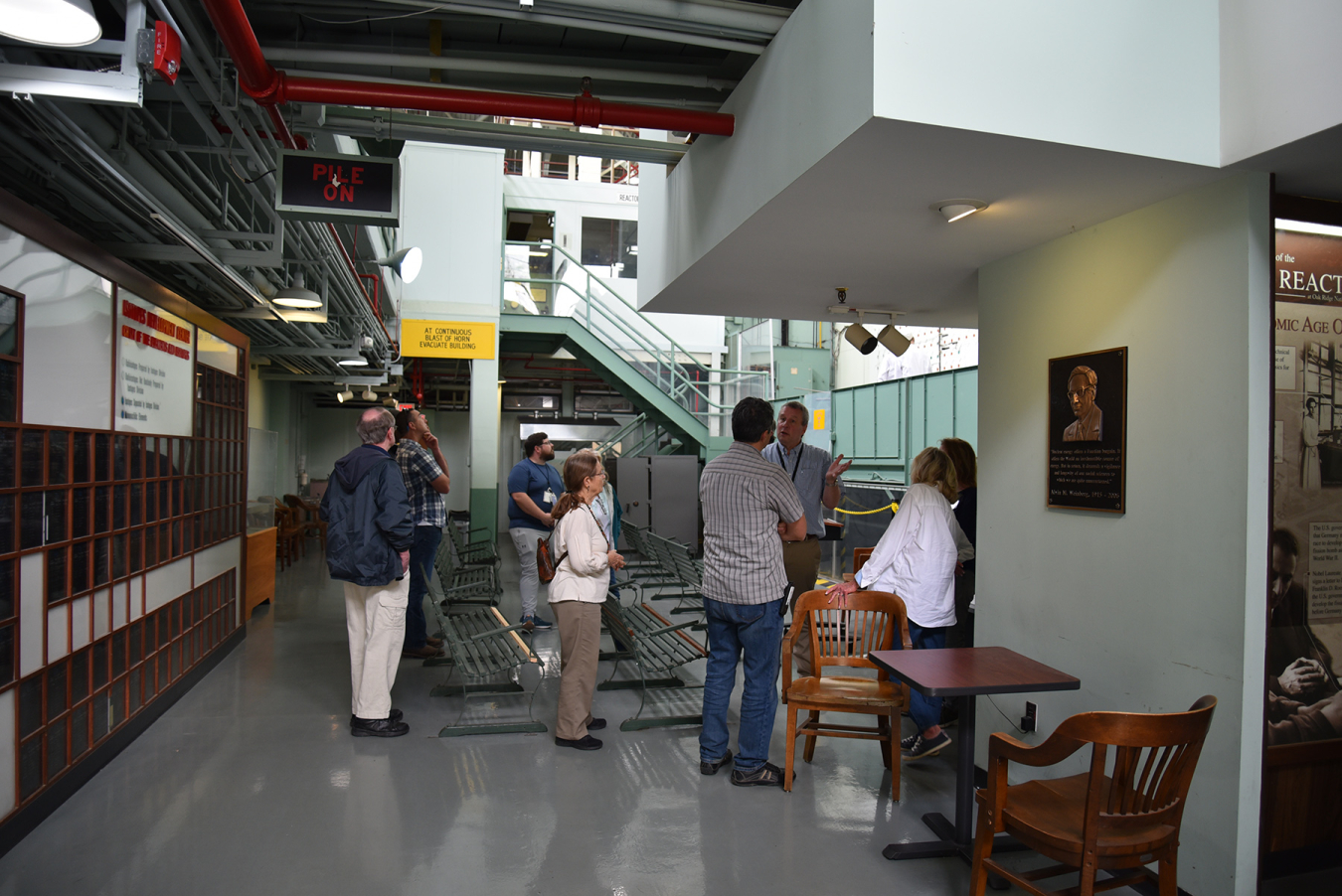 Oak Ridge Office of Environmental Management Regulatory Affairs Specialist Roger Petrie tells members of the Oak Ridge Site Specific Advisory Board the history and role of the Graphite Reactor at Oak Ridge National Laboratory. The facility is part of the Manhattan Project National Historical Park.