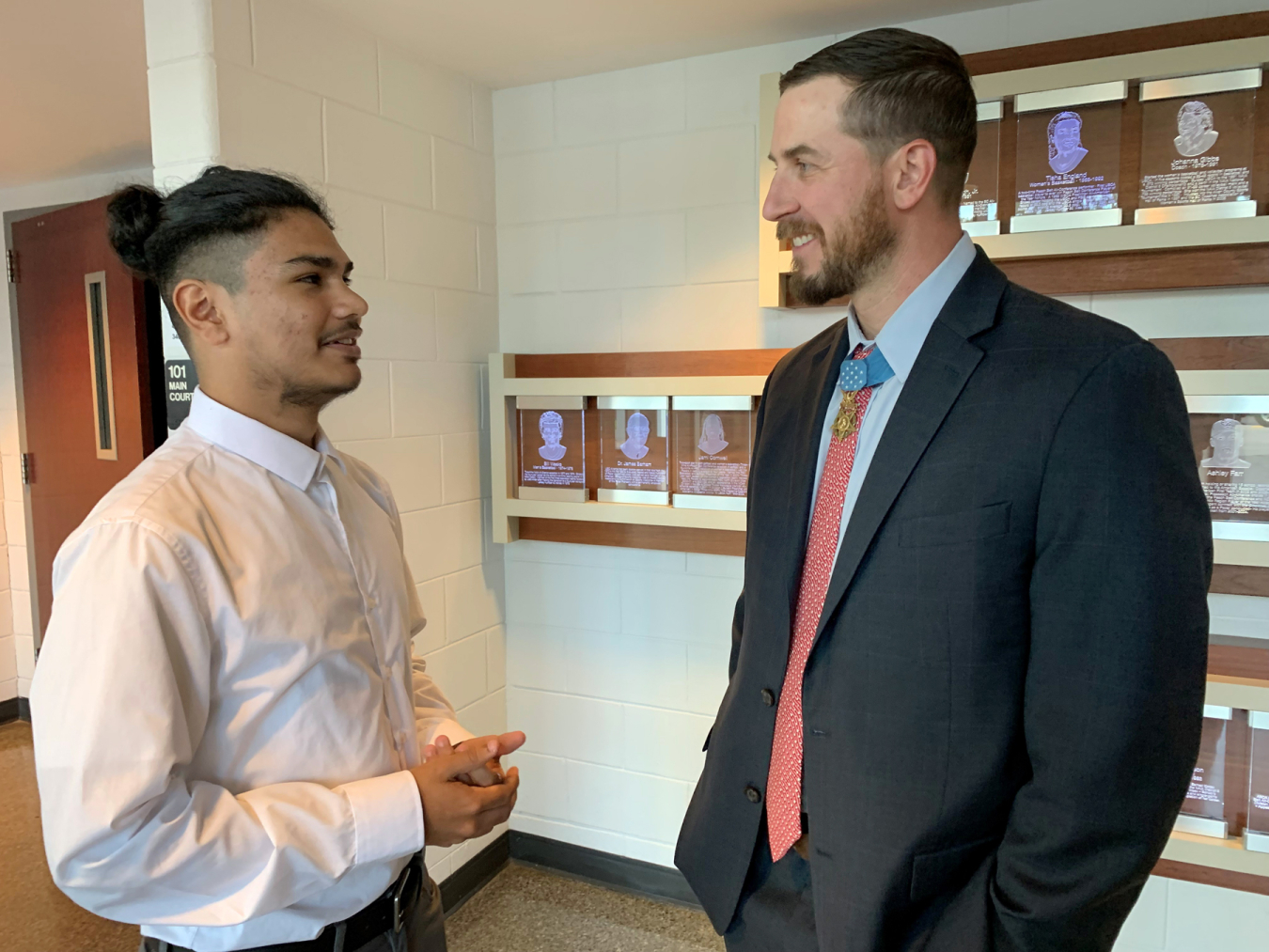 Midland Valley High School senior Christian Carrillo receives advice from Medal of Honor Recipient Sergeant Ryan Pitts, (U.S. Army, Airborne), at this year’s Our Community Salutes event honoring area students who have recently enlisted in the U.S. Armed Forces.